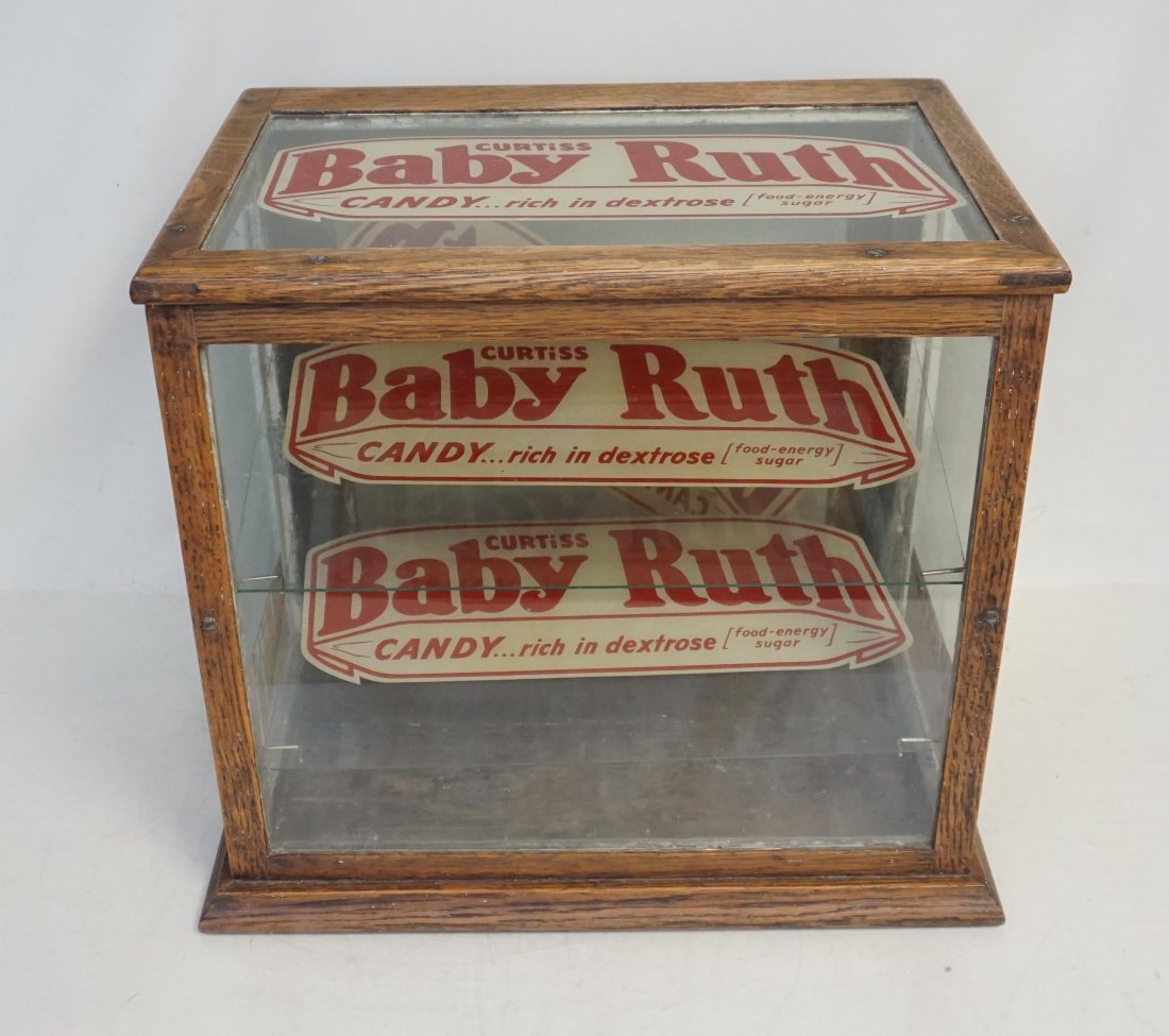 CURTISS CANDY OAK COUNTERTOP DISPLAY: Vintage 1930 Oak General Store Curtiss Candy Countertop Display. Baby Ruth and Butterfinger Candy...Rich in Dextrose (Food Energy Sugar). Glass Top and all four sides. Slanted shelves to hold candy ba