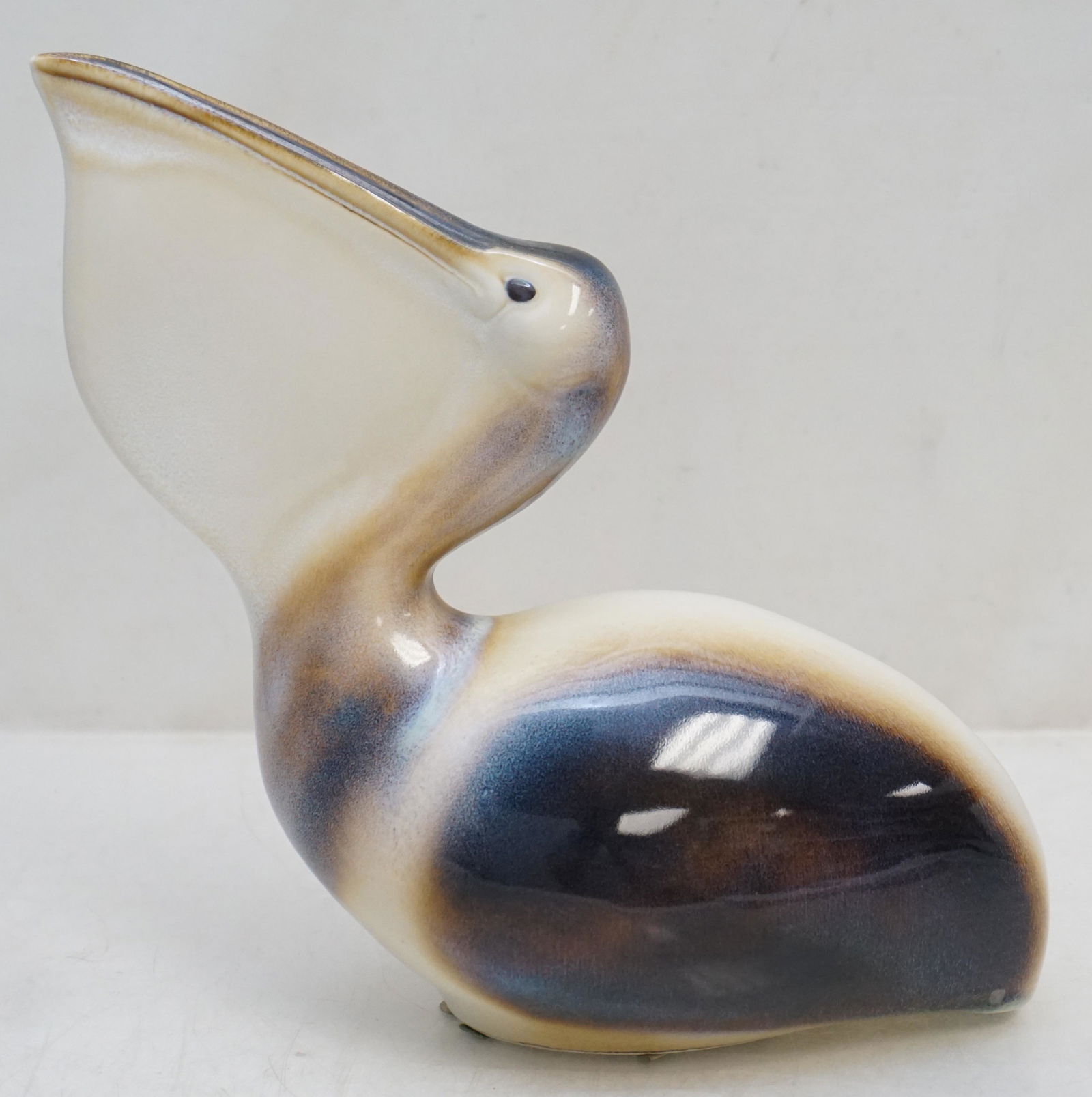 GOEBEL LARGE LJUBISA MISIC PELICAN: Large West Germany Goebel Porcelain Pelican designed by Ljubisa Misic, 1984, very hard to find. Original label on the underside. Measures 9 1/4" tall and 19" long. Weight 1 pd 3 oz. PROVENANCE: A Priv