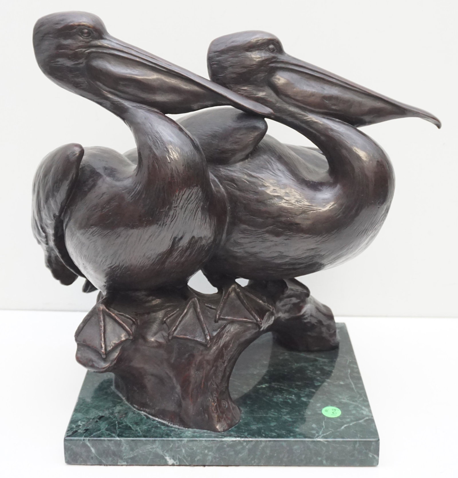 BRONZE PELICAN SCULPTURE: Large 20th c. Bronze Sculpture Two Pelicans on Log mounted to Green Marble Base. Signed Lou Harold Betts and A P for Artists Proof (foundry proof). Measures 16"x11"x17". Approximately 53 pds. PROVENAN