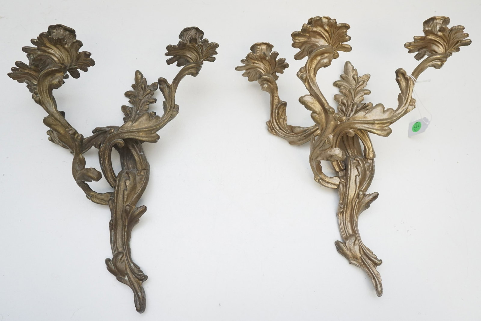 FRENCH BRONZE 3 LIGHT SCONCES: French Bronze Wall Sconces, 3 light candle. Each measures 15"long. 12"wide and 8"deep. Weight 13 pds. PROVENANCE: Gippy Plantation, Berkeley County.