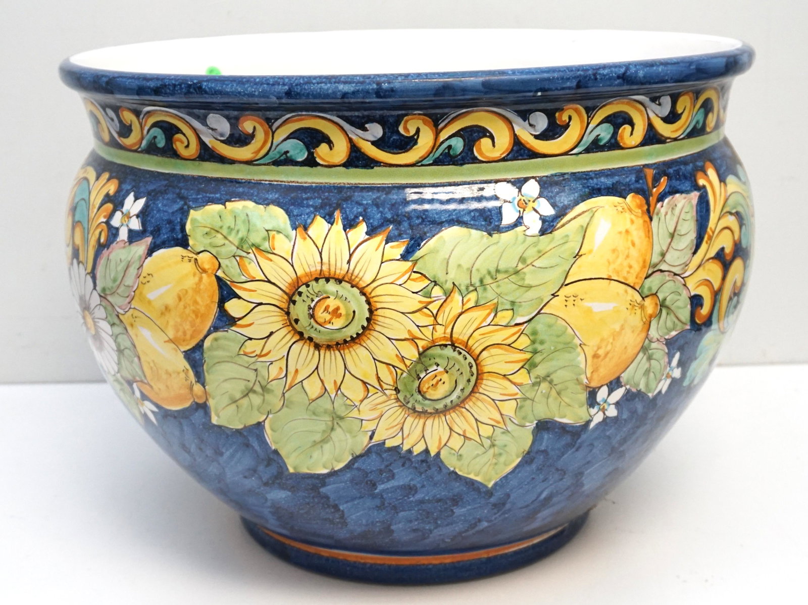 LARGE VIETRI ITALIAN MAJOLICA JARDINIERE: Very large Majolica Italian Vietri hand painted Planter / Jardiniere. Lemons, Sunflowers and Daisies on Cobalt Blue. Measures 20"x20"x15". Weight approximately 28 pds. PROVENANCE: Gippy Plantation, Be