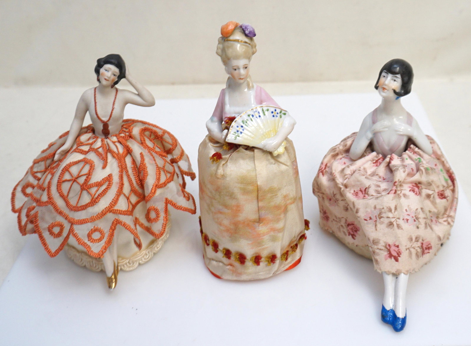 3 PORCELAIN PINCUSHION DOLLS: 3 Vintage Elegant 1920s-30s Porcelain Pincushion Dolls. Good condition 5 1/2" to 5 3/4". Weight on all 12 oz. PROVENANCE: A Private Charleston SC Estate.