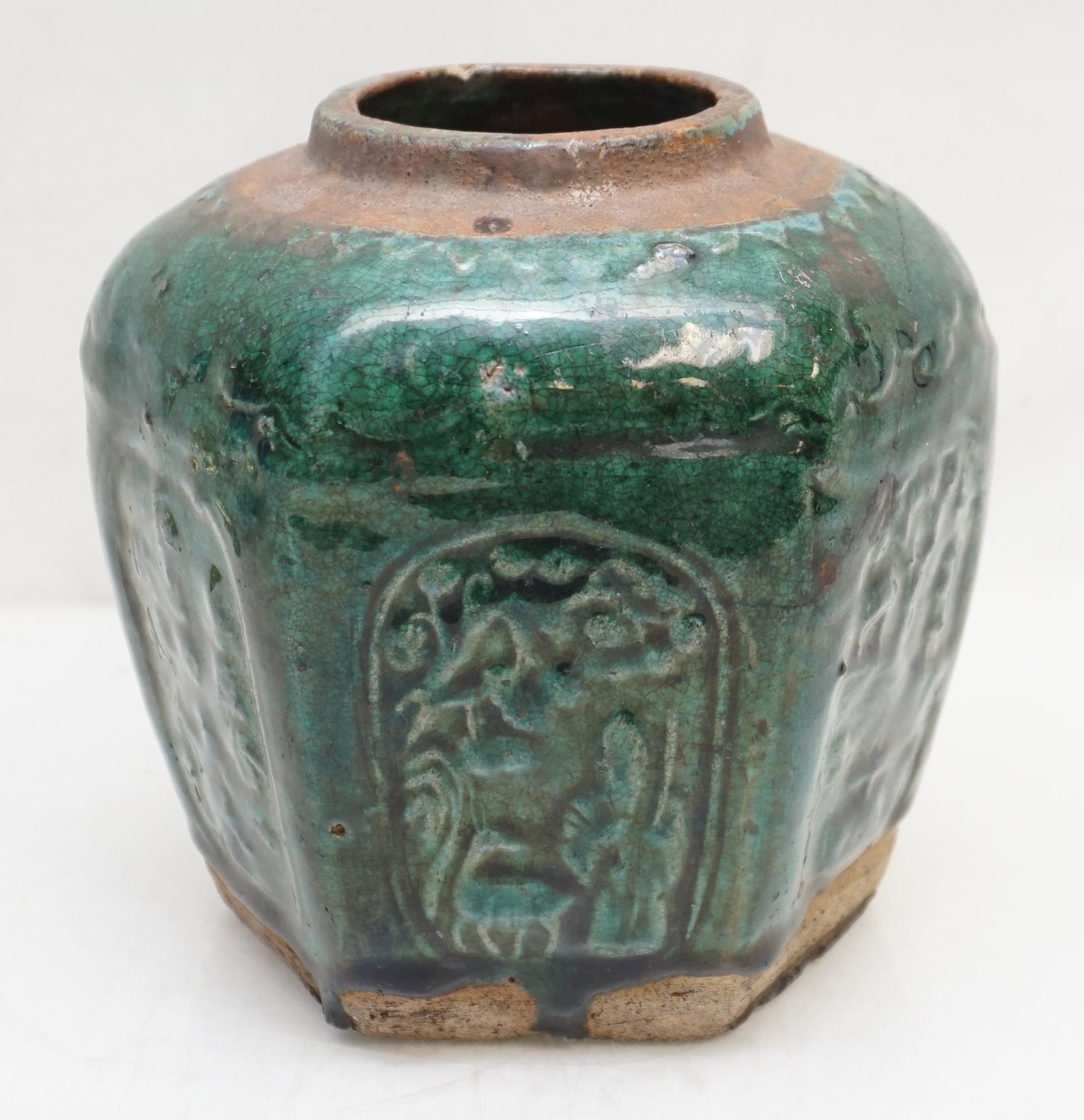SHIWAN GREEN GLAZE GINGER JAR: Chinese Shiwan Ginger Jar. Made from earthenware with a deep green glaze, c. late 19th to early 20th century. Measures 6"x6"x6 1/2". Weight 2 pds. PROVENANCE: A Private NYC/Charleston SC Estate.
