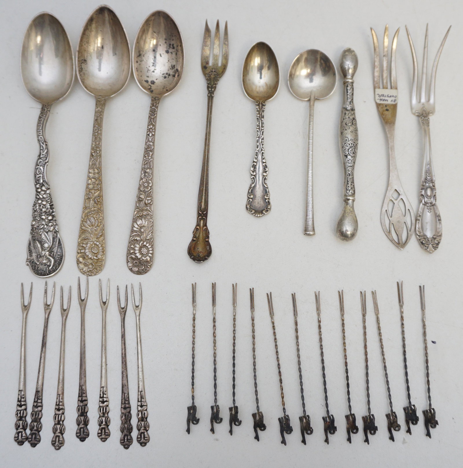 16 PC STERLING SILVER SPOONS +: 1- Two S. Kirk Baltimore Sterling Silver Repousse Spoons 6". 2- Sterling Silver Montgomery Bros. Los Angeles 1892 Spoon 5 3/4". 3- Victorian Glove Darner 4 1/4", dent. 4- Towle Sterling Silver Lemon F
