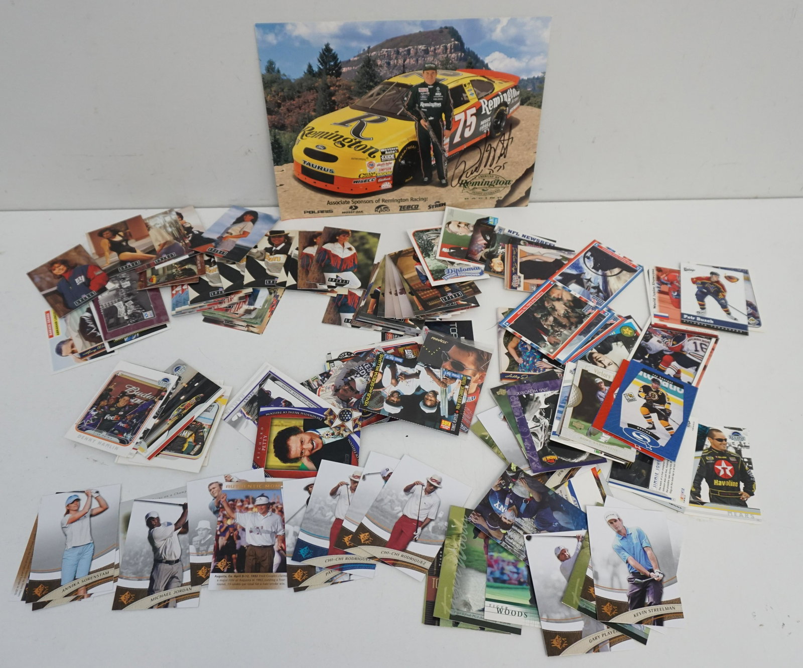 LARGE LOT NASCAR - HOCKEY - GOLF +: Large Group of Trading Cards Nascar, Hockey, Golf and more. Too many to count. Autographed Rick Mast Remington Rifle. Weight on all 1 pd. All in very good condition. Perfect lot for dealer or collecto