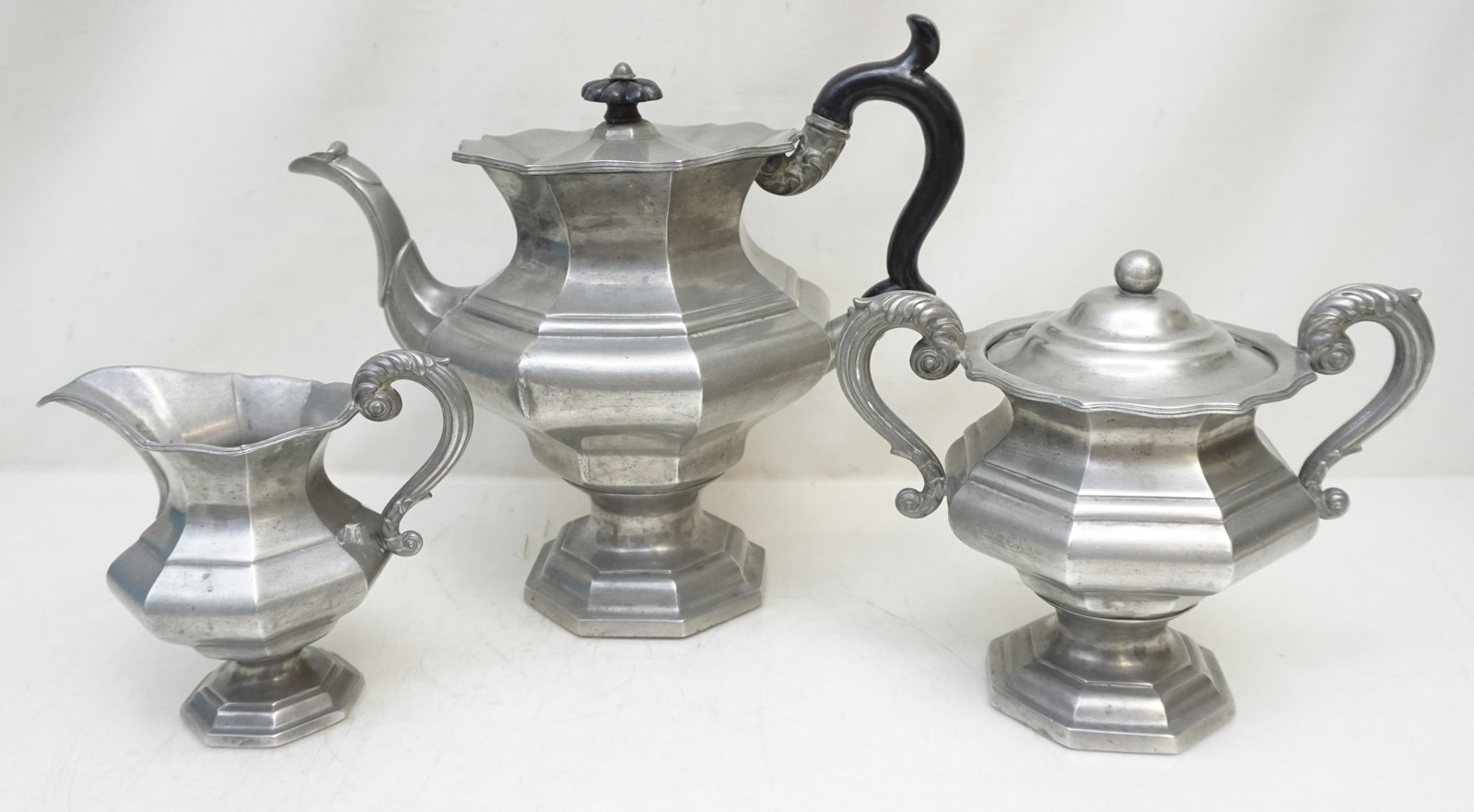 19th c JAMES DIXON & SONS PEWTER TEA SET: James Dixon & Sons Three Piece Tea Service c. 1835-1850. Coffee 10". Covered Sugar 7" and Creamer 5 1/2". Weight on all 4 pds 6 oz. PROVENANCE: A Private Charleston SC Estate. James Dixon & Sons, foun