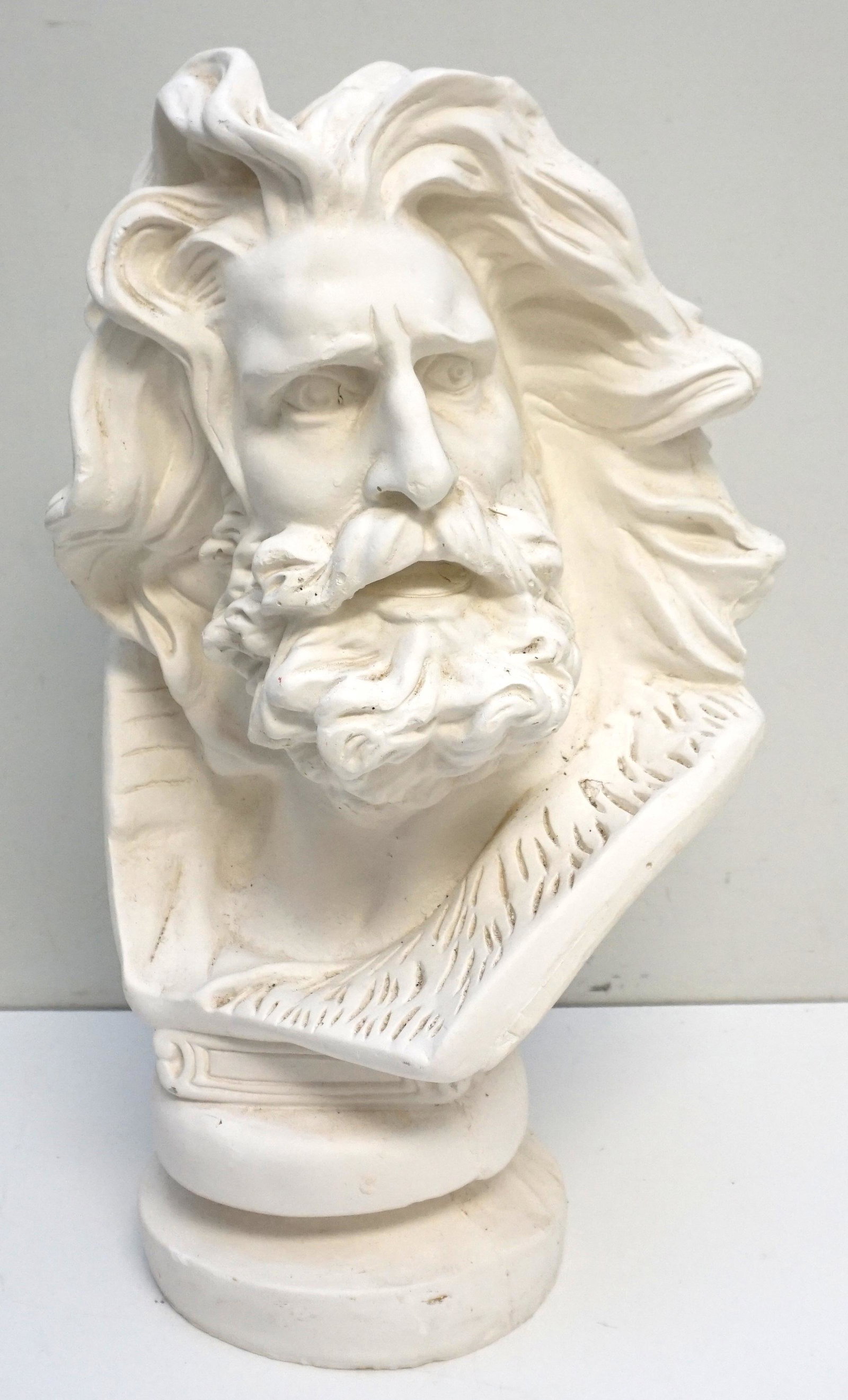 LARGE PLASTER BUST MOSES: Vintage reproduction white plaster bust of a windswept Moses after the artist Michelangelo Buonarroti. Great garden addition. Measures 11"x9"x21 1/2". Weight 23 pds. PROVENANCE: A Private Charleston S