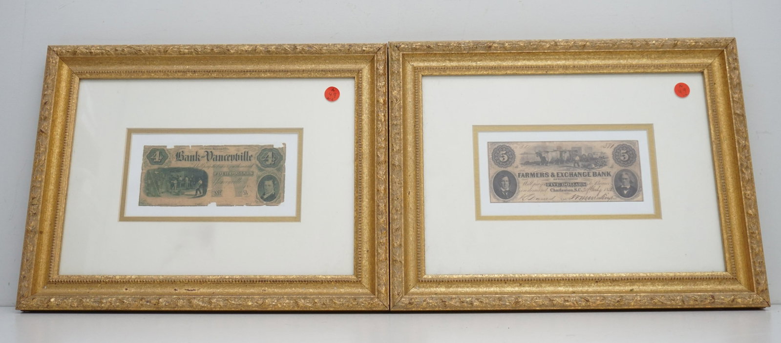 2 BANKNOTES CHARLESTON & YANCEYVILLE: Framed copies 1856 $5 Farmers & Exchange Bank Charleston, SC Bank Note and Yanceyville NC Bank Note. Both Professionally framed and double matted 16 3/4"x13"x1 1/4". Weight 6 pds. PROVENANCE: A Privat