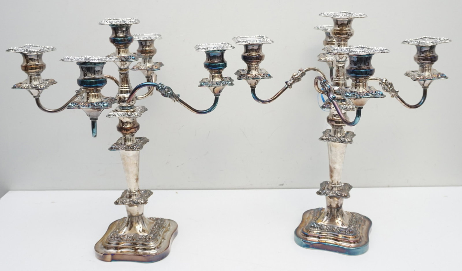 PAIR LARGE CANDELABRA BIRMINGHAM SP: Large Pair of Vintage 4 Branch Silver Plated Candelabra by Birmingham Silver Co, NY. All have individual separate bobeches. Each 16"x16"x18 1/2". Weight combined 18 pds. PROVENANCE: Edwin Moore Brogdo