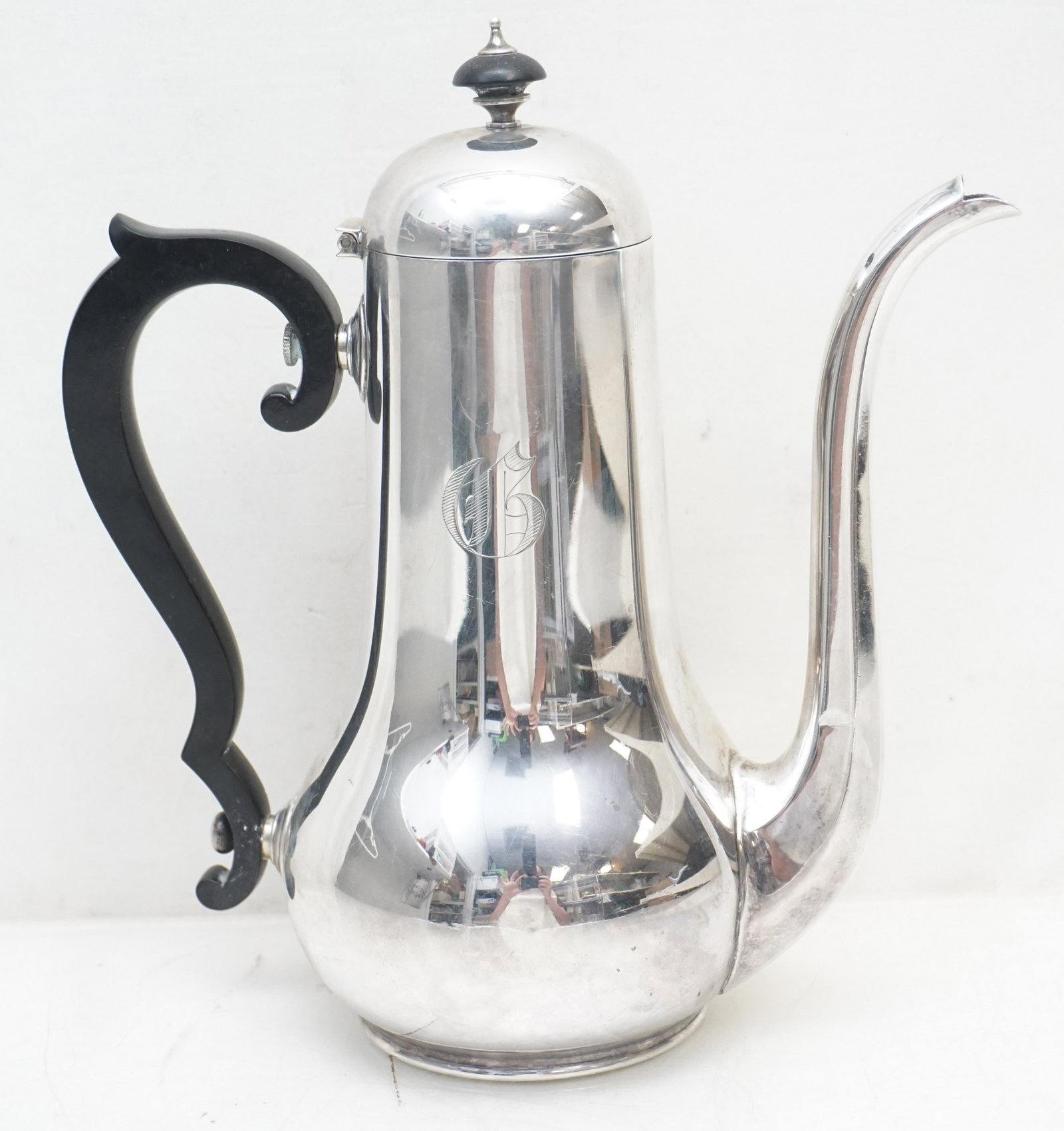 GORHAM STERLING DEMITASSE POT: Gorham sterling silver demitasse pot with black ebonized wood handle and finial, marked on underside with old lion-anchor-G marks and date mark for 1920s, 1 5/8 pint mark, A12651. Monogrammed. Measure