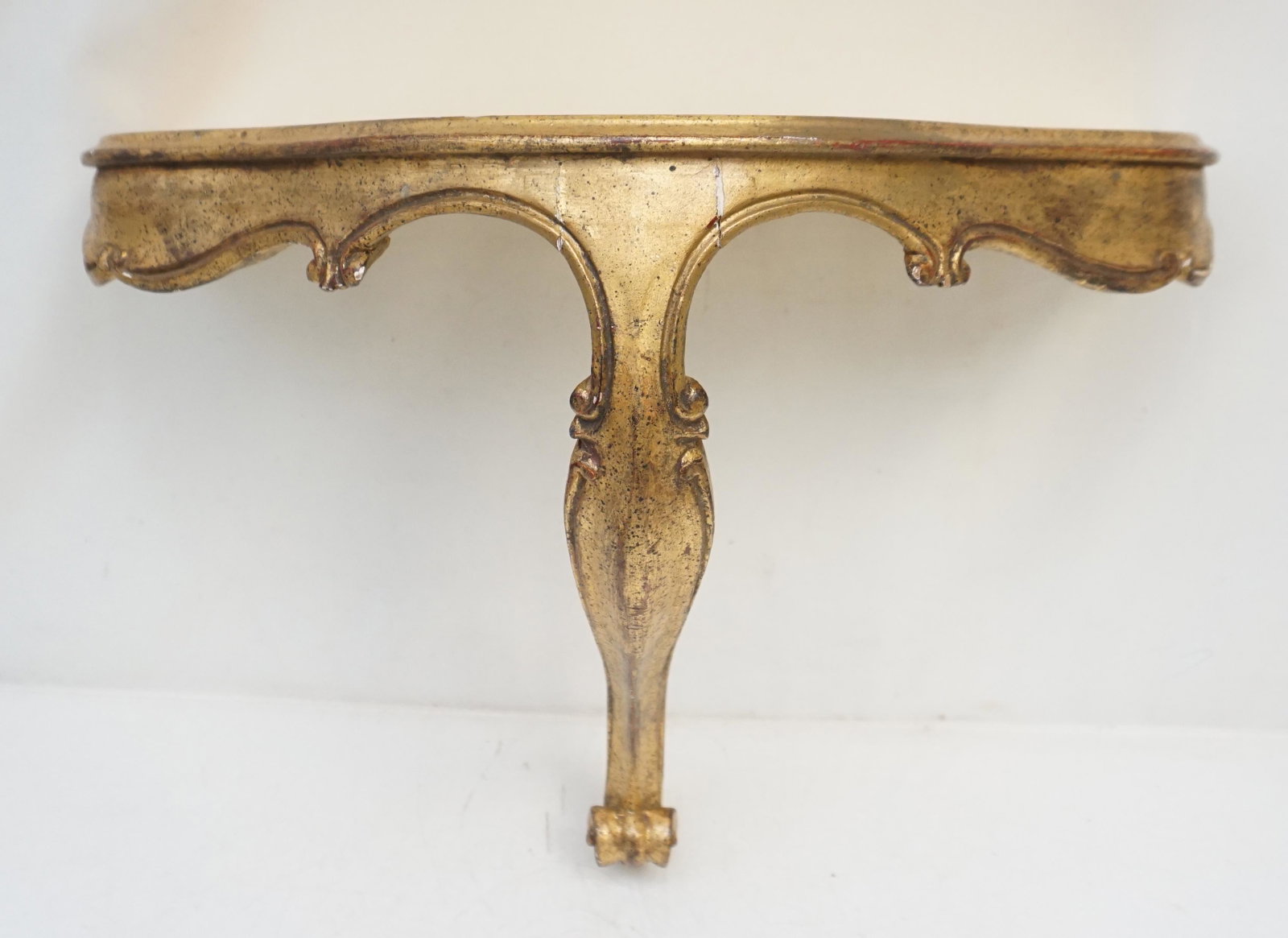 ITALIAN FLORENTINA WALL SHELF: Vintage Mid Century Italian Florentine Gold Wall Shelf. Shelf measures 21"x10"x15". Weight 2 pds. PROVENANCE: A Private Charleston SC Estate