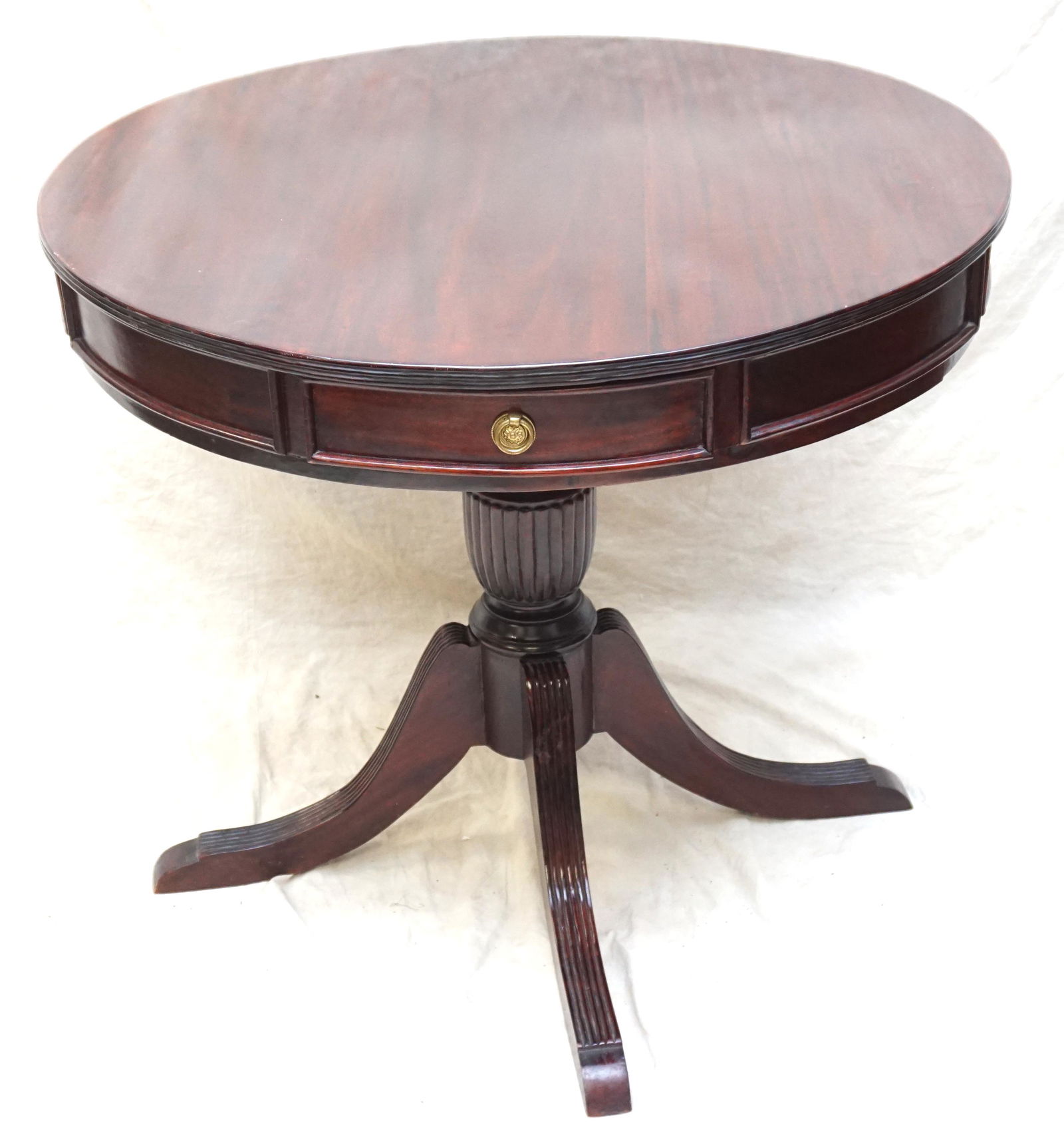 MAHOGANY REGENCY DRUM TABLE: Antique English 19th c. Regency Style Mahogany Drum Table with brass hardware. Measures 35"x35"x32". PROVENANCE: A Private Charleston SC Estate. ***Pickup only or Shipping on this item offered through