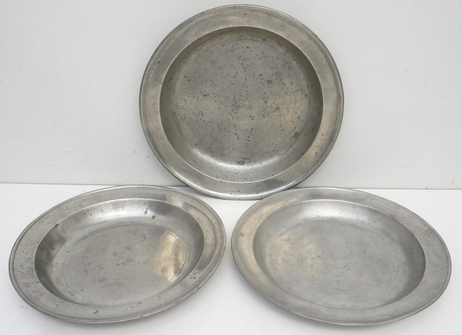 3 18TH C PEWTER LARGE CHARGERS: Three large 18th c. Pewter Chargers / Basins. 1- Deep Dish / Charger Samuel Dansforth, Hartford CT, c 1795-1816, eagle touchmarks 13 1/4". 2- Deep Dish / Charger Ashbil Griswold, Meriden CT c 1802-184