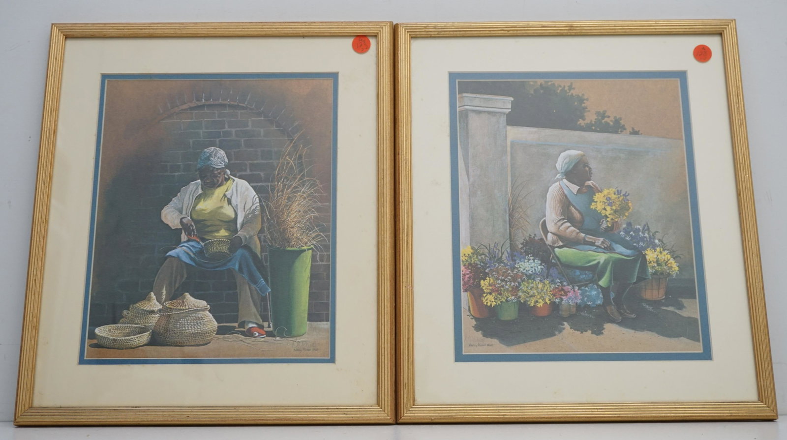 2 NANCY RICKER RHETT LOWCOUNTRY PRINTS: Two Gold Framed Prints by Nancy Ricker Rhett, renowned watercolor artist and gallery owner in Beaufort, SC. Basket Weaver and Flower Lady. Both signed in the plate and again in pencil by the artist. I