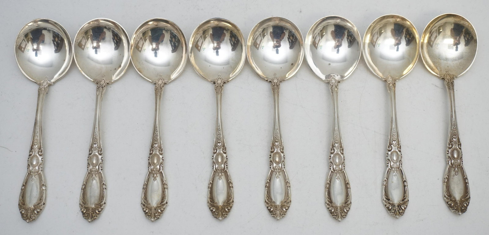 8 STERLING KING RICHARD CREAM SOUP - TOWLE: Eight Sterling Silver Round Bowl Soup Spoon (Cream Soup) in the King Richard Pattern by Towle Silversmiths 1932. No monograms. Each 6 1/8". Weight approximately 400 grams.PROVENANCE: Edwin Moore Brogd