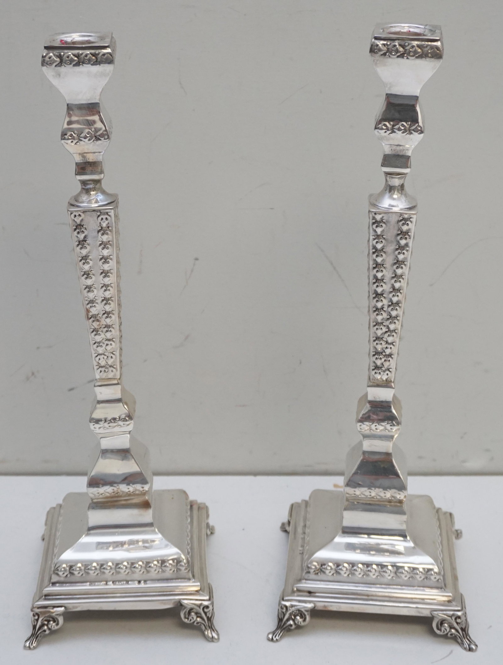 PAIR STERLING SILVER CANDLESTICKS: Matched Pair of Vintage 925 Sterling Silver Hazorfim Candlesticks. Each 4 1/4"x4 1/4"x12 3/4". Weight approximately 480 grams. PROVENANCE: Edwin Moore Brogdon, PhD, collection. Dr. Brogdon was the own