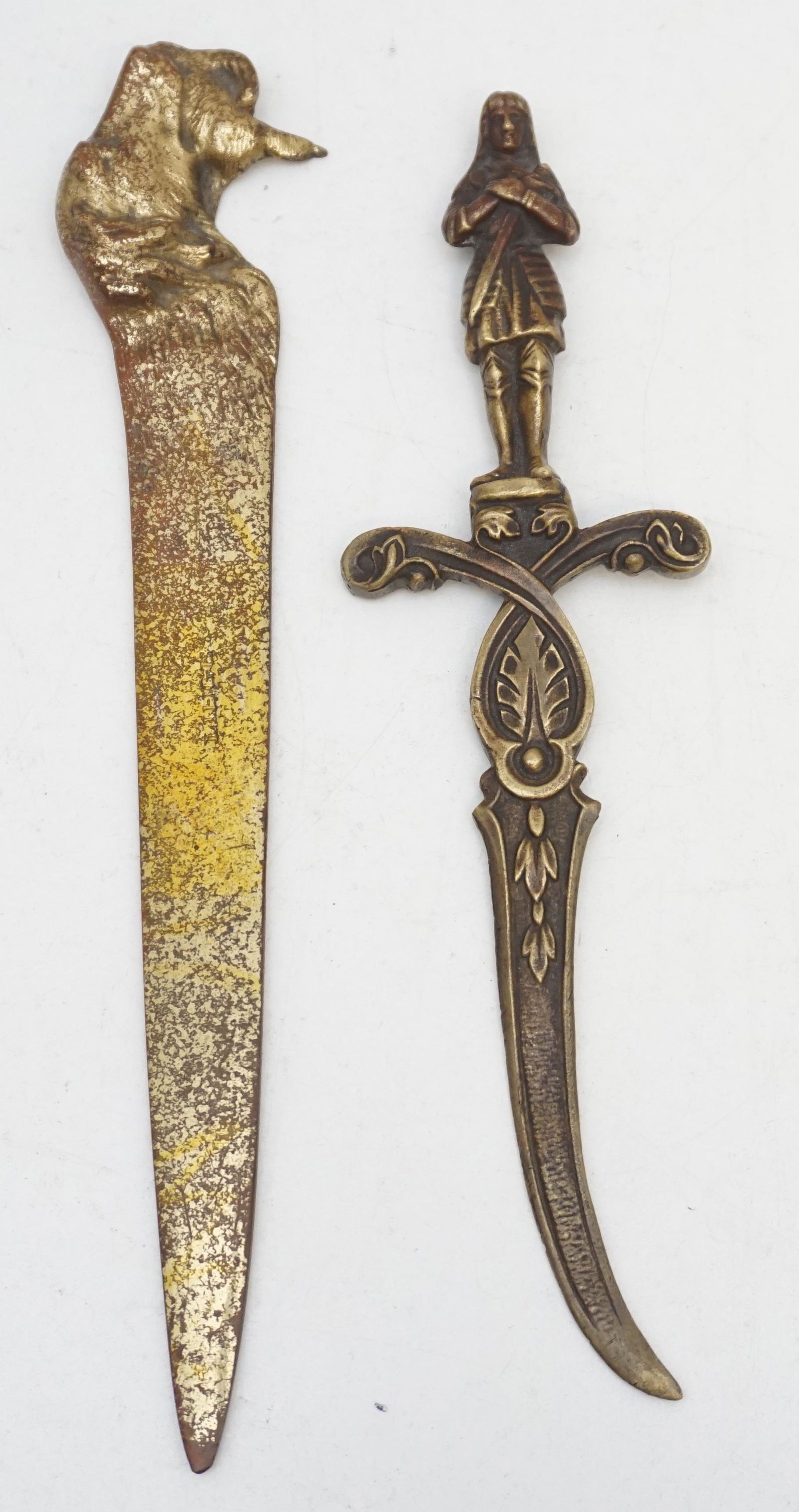PAIR ANTIQUE BRONZE LETTER OPENERS: Pair of Antique Letter Openers. 1- French Antique Figural Bronze Joan of Arc 10". 2- Brass Vintage 1920s Retriever stamped Liege from Belgium 10 1/2". Weight combined 13 oz. PROVENANCE: A Private NYC/