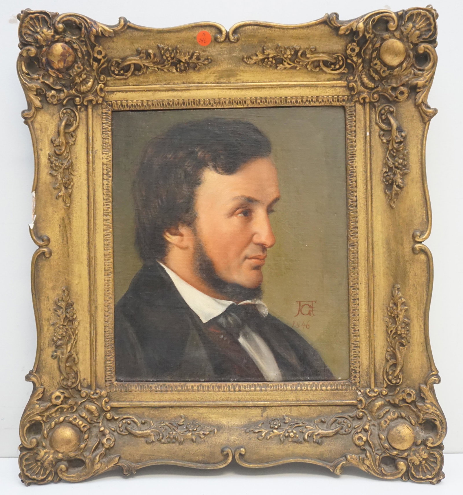 19th c GENTLEMANS PORTRAIT c. 1846: Antique 19th c. Oil on Canvas Portrait of a Gentleman, Signed with a monogram and dated 1846. In ornate antique gilt wood frame. In frame measures 21"x24"x2 1/2". Weight 8 pds. PROVENANCE: Edwin Moore