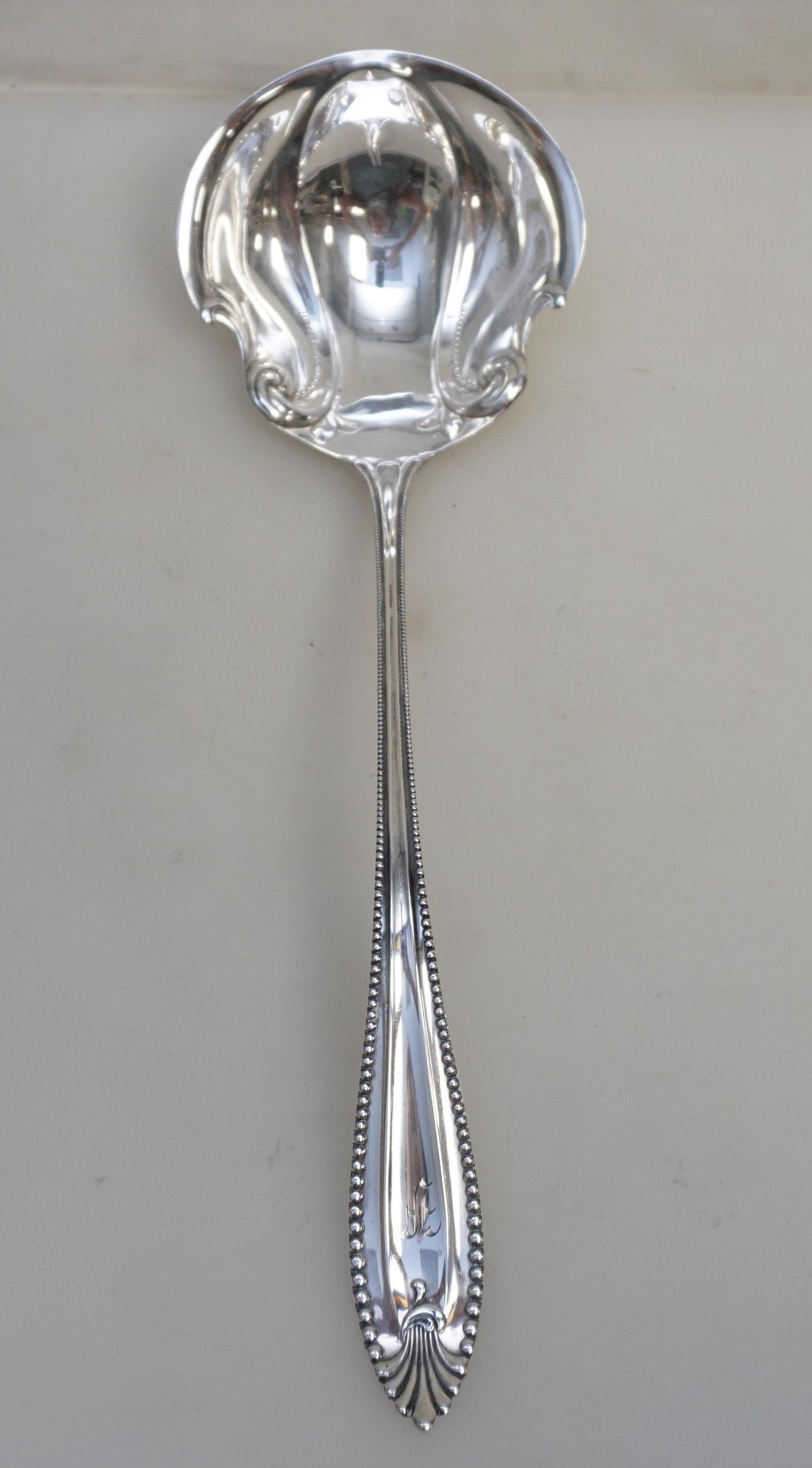 TOWLE CORDOVA STERLING SILVER PUNCH LADLE: Antique Towle Sterling Silver Cordova 1902 Large Punch Ladle. Monogram "F". Good condition, measures 11 1/4" inches long. It weighs approximately 4.16 troy ounces. PROVENANCE: Edwin Moore Brogdon, PhD