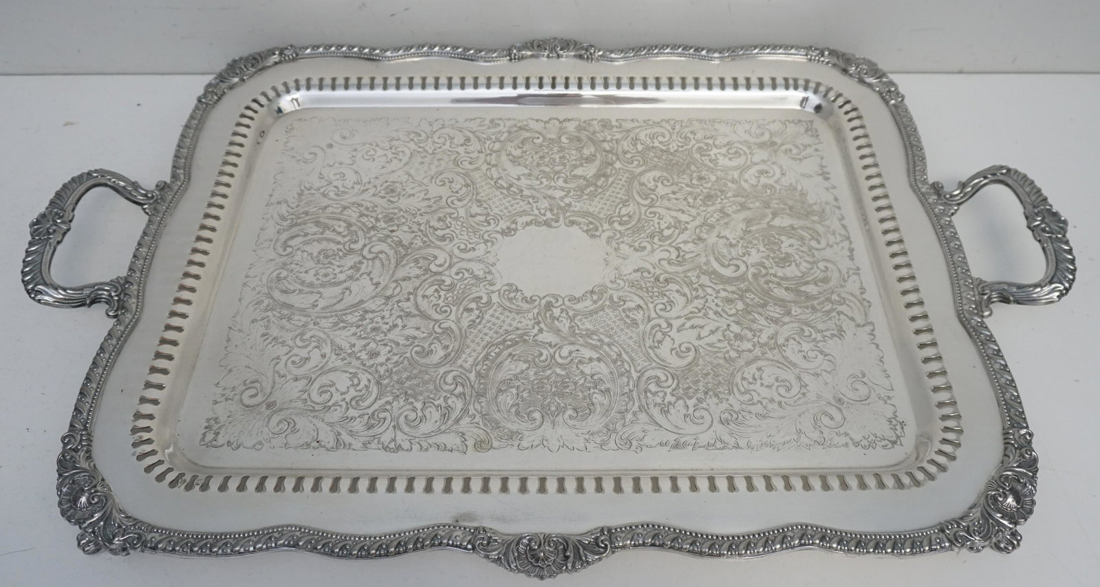 LARGE VICTORIAN BUTLERS TRAY: A large good quality Silverplate Footed Butlers Tray. Measures 30"x19 1/2"x2 1/2". Weight 15 pds. PROVENANCE: Edwin Moore Brogdon, PhD, collection. Dr. Brogdon was the owner of Brogdon Manor, a statel