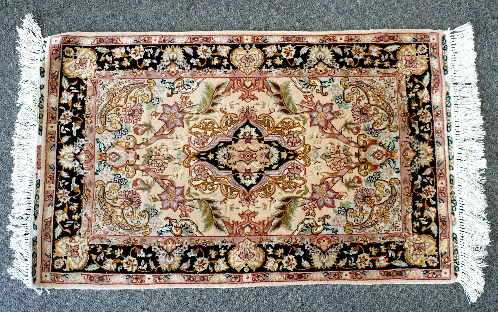 SMALL TABRIZ RUG 2.5 FT: Small 20th c. Tabriz Rug. Perfect for small area / entrance. Excellent condition. Measures 39x24" with 2.5" fringe. PROVENANCE: A Private Charleston SC Estate