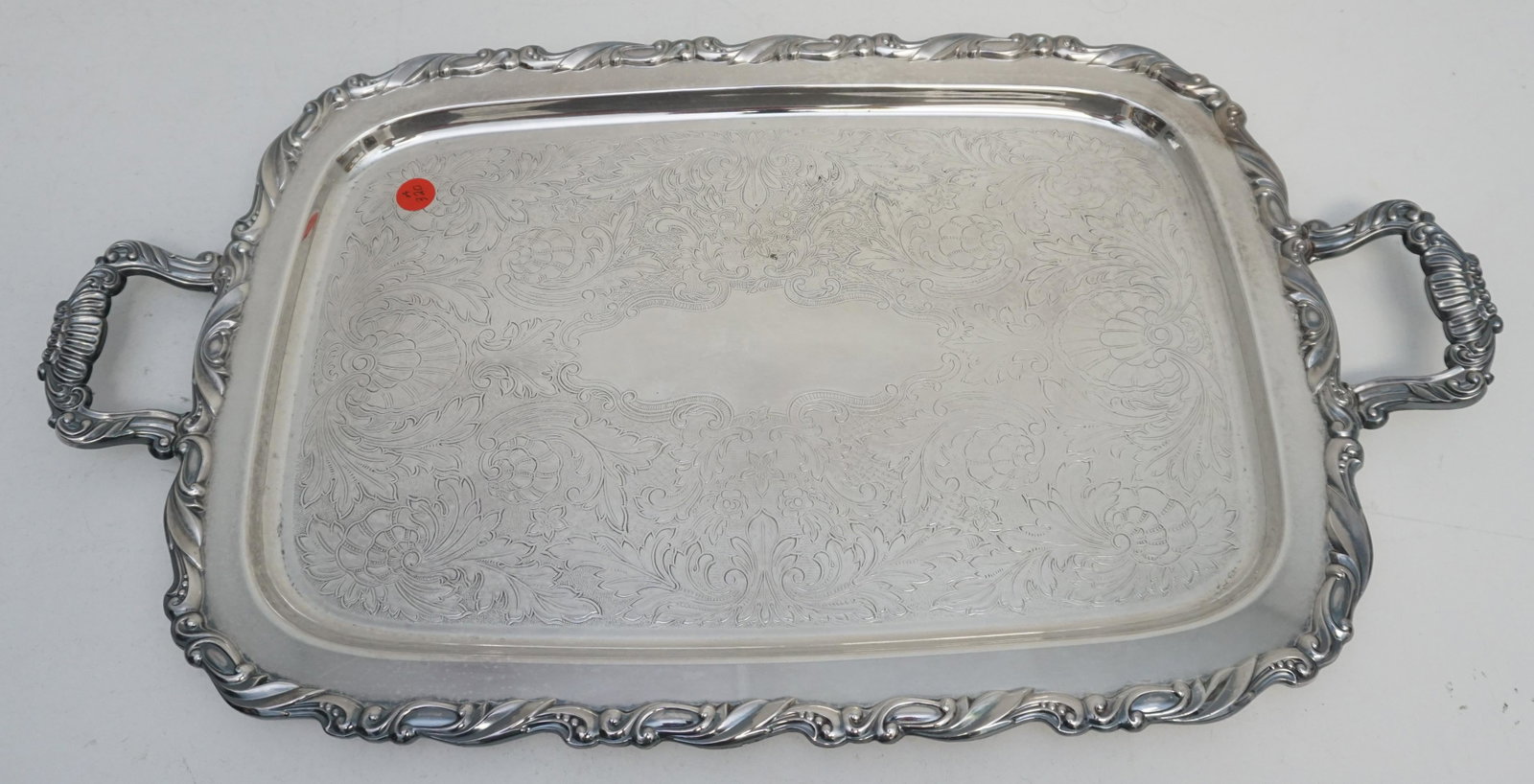 ONEIDA SILVERPLATE SERVING TRAY: Vintage Oneida Etched Silver Plate Tray. Measures 24"x13 1/2"x1 1/2". Weight 6 pds. PROVENANCE: Edwin Moore Brogdon, PhD, collection. Dr. Brogdon was the owner of Brogdon Manor, a stately plantation h