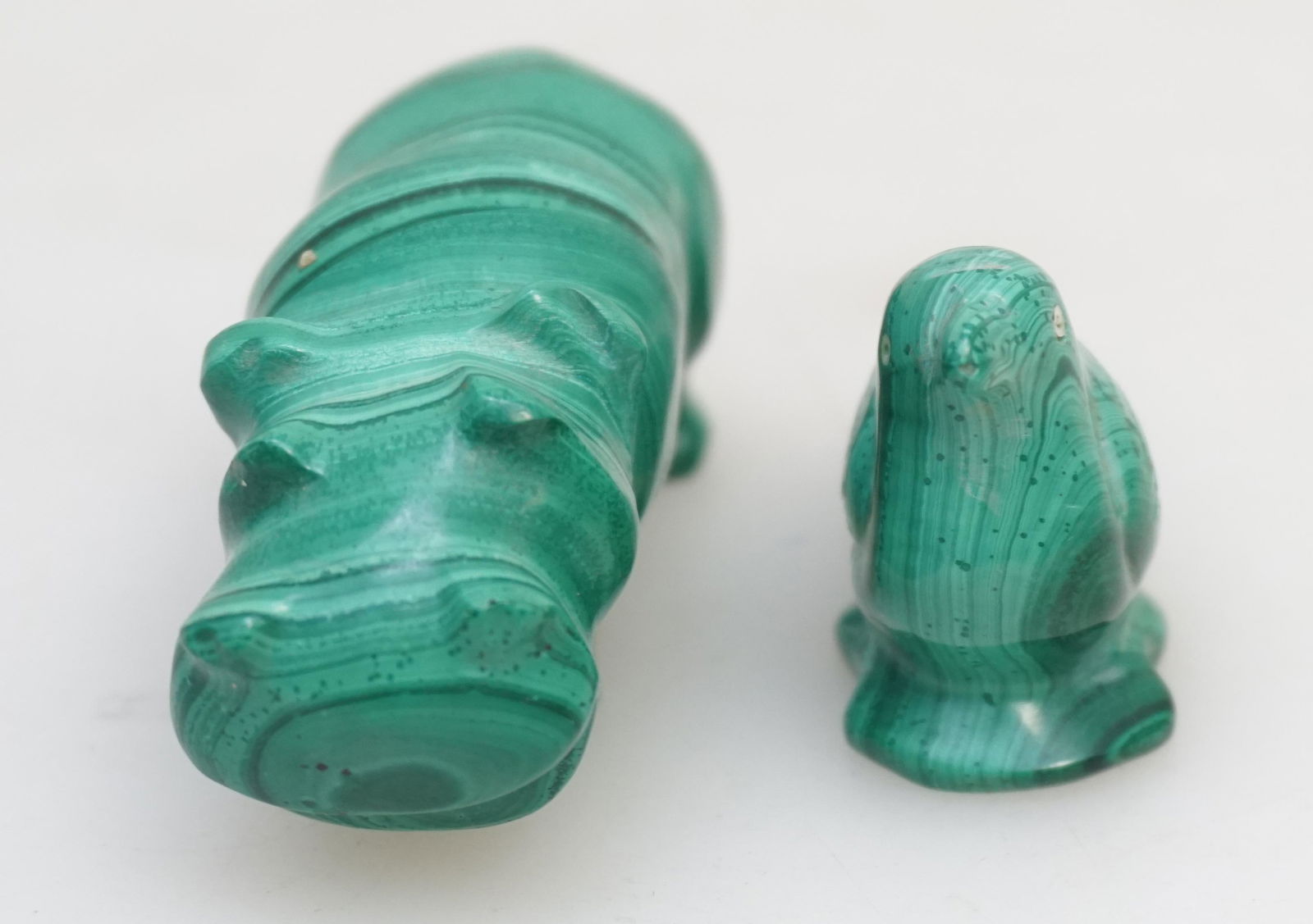 MALACHITE CARVED HIPPO + BIRD: Vintage Carved Smiling Malachite Hippo 2 3/4" and Bird 2 1/4". Weight combined 6 oz. PROVENANCE: A Private Charleston SC Estate.