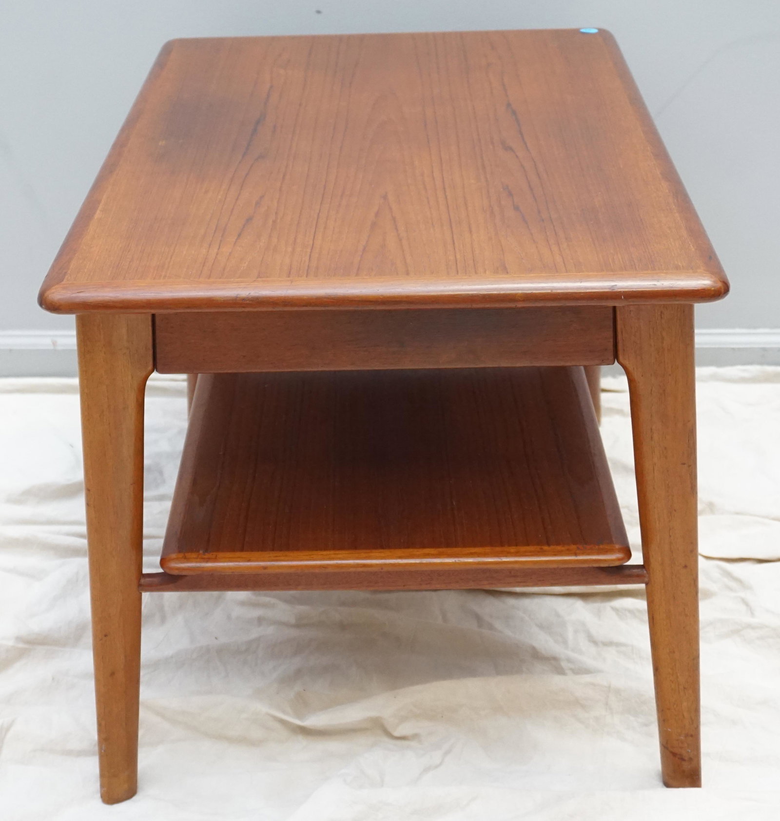 DANISH SVEND MADSEN 1960 SIDE TABLE: Vintage 1960's Mid Century Modern Teak Side Table designed by Svend Madsen for Falster Mobelfabrik of Denmark. Solid teak wood, a single dovetailed frieze wood drawer, with a solid wood lower shelf. T