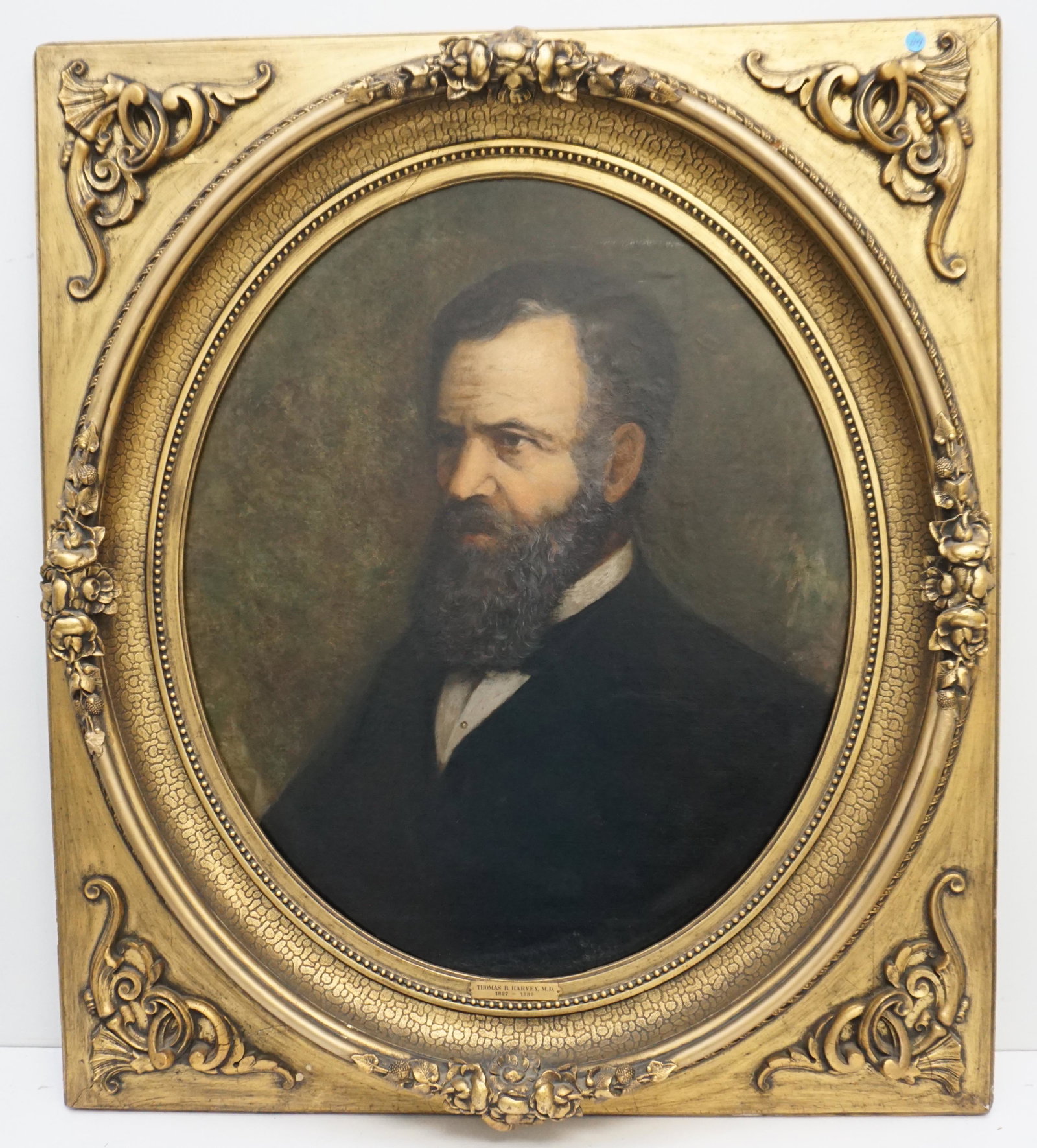 ANTIQUE PORTRAIT THOMAS R. HARVEY: Antique Oil on Canvas Portrait of Thomas R. Harvey, MD, (1827-1889). Unsigned. In magnificent ornate carved gilded period frame. Stretcher 25"x30". In frame 35"x41"x 4 1/4". Weight approximately 30 Po