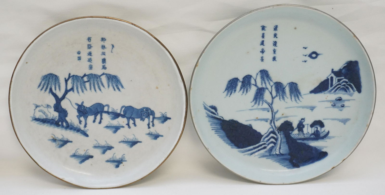 2 KANGXI BLUE WHITE DISHES: 2 Hand Painted Chinese Kangxi Dishes. Painted on the interiors, one with a water and boat landscape 7", the other with horses 6 1/2, both with poetic inscriptions. Both with two-character wan yu mark