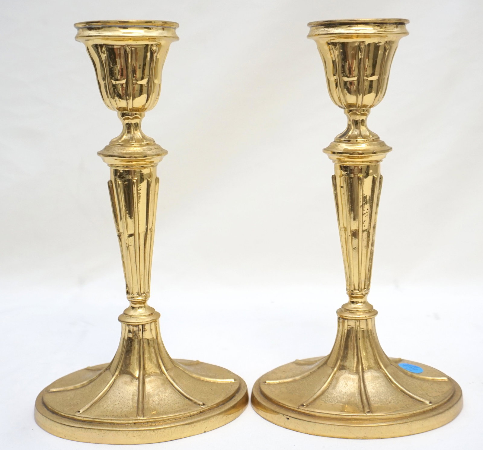 MOTTAHEDEH BRASS CANDLESTICKS: Pair Vintage Mottahedeh 9 1/2" Brass Georgian Candlesticks Oval Base. Weight 3 pds 8 oz. PROVENANCE: Edwin Moore Brogdon, PhD, collection. Dr. Brogdon was the owner of Brogdon Manor, a stately plantat