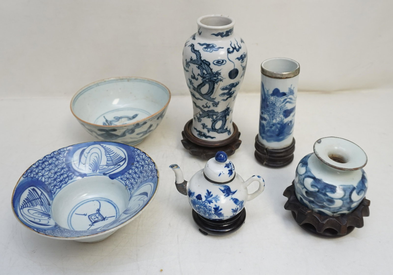 6 PC ANTIQUE CHINESE KANGXI PORCELAIN: All Antique Chinese Blue and White Porcelain. 1- Ming Dynasty Bowl 5 1/2"x5 1/2"x2 1/2". 2- Dragons chasing the elusive Pearl Vase 6" with mark for Kangxi Nian Zhi -"Kangxi Period Make". C. 1900-1910.