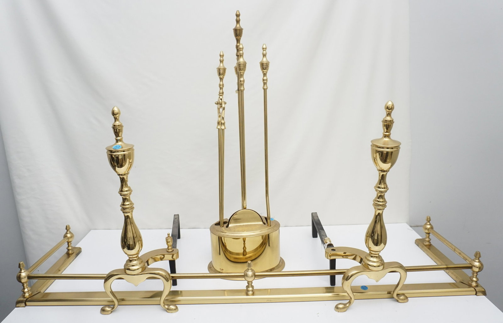 VINTAGE BRASS FENDER & ANDIRONS: Vintage Brass Fireplace Fendor and Andirons. Good Qualitry Andirons 20" tall and 21" long. Fender 47" long. PROVENANCE: A Private Charleston SC Estate. ***Pickup only or Shipping on this item offered 