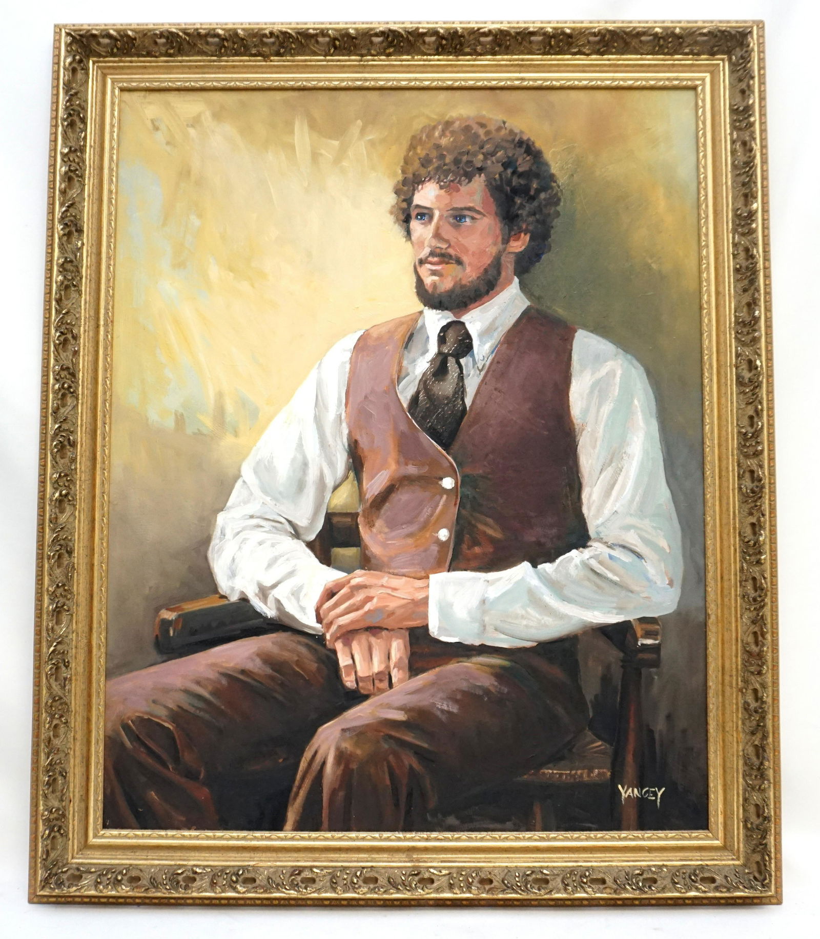 VINTAGE OIL ON CANVAS PORTRAIT: Vintage c. 1970s Oil on Canvas Portrait of a bearded young gentleman in a gold pierced cyma curve frame. Signed Yancey lower right. Kind of a young Bob Ross-ish look. In frame 29"x35 1/2"x1 1/2". Weig