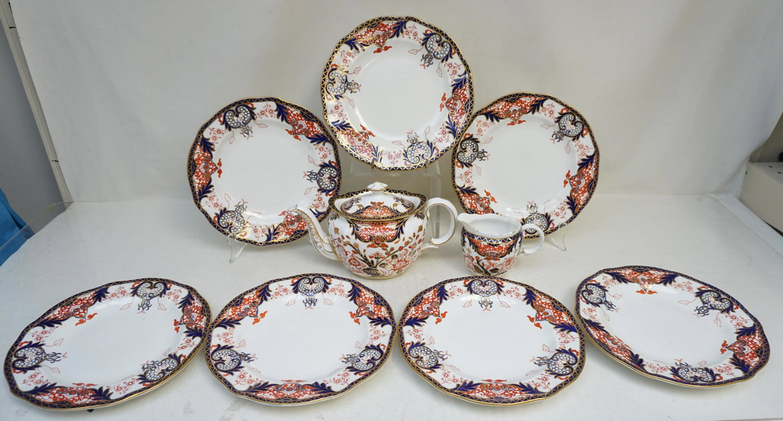 9 pc ANTIQUE ROYAL CROWN DERBY IMARI: Nine Piece Antique Royal Crown Derby n the early Kings Pattern #3615. With mark used from 1891 to 1921 by the Osmaston Road factory. 7 Dessert Plates 9". Creamer 3 1/2". Teapot with old English staple