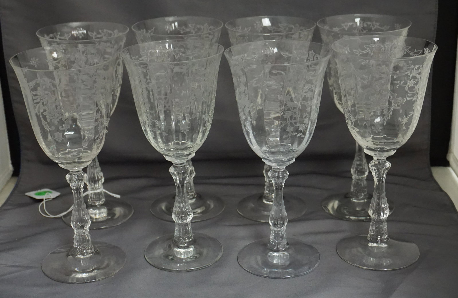 8 FOSTORIA NAVARRE WATER GOBLETS: Eight (8) 1930s Fostoria Elegant Etched Water Goblets in the Navarre Pattern. Each 7 5/8". Weight on all 4 pds. PROVENANCE: Edwin Moore Brogdon, PhD, collection. Dr. Brogdon was the owner of Brogdon M