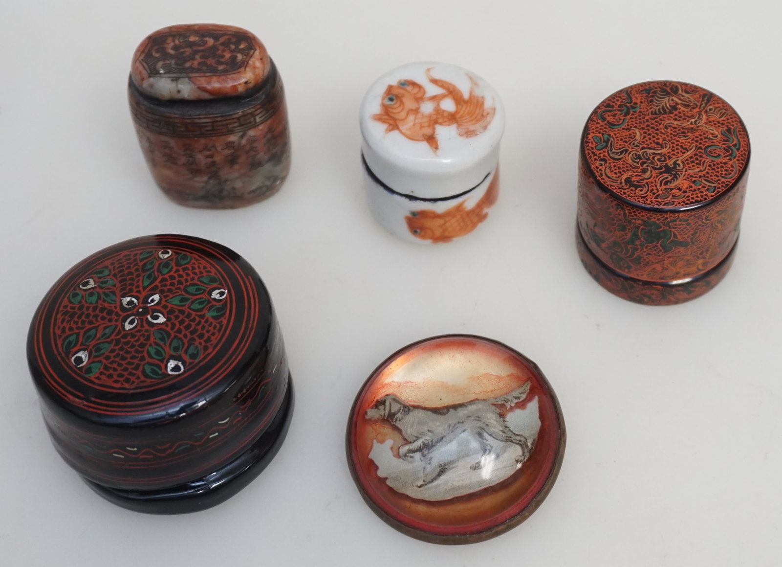 GROUPING OF 5 MINIATURE JADE - LACQUER - PORCELAIN: Grouping of Antique Vintage Collectible Smalls. 1- Antique Japanese Traveling Small Porcelain Ink Bottle with Hand Painted Koi 1 2/8". 2- Chinese Red Jade carved seal engraved with Buddhism scene and 