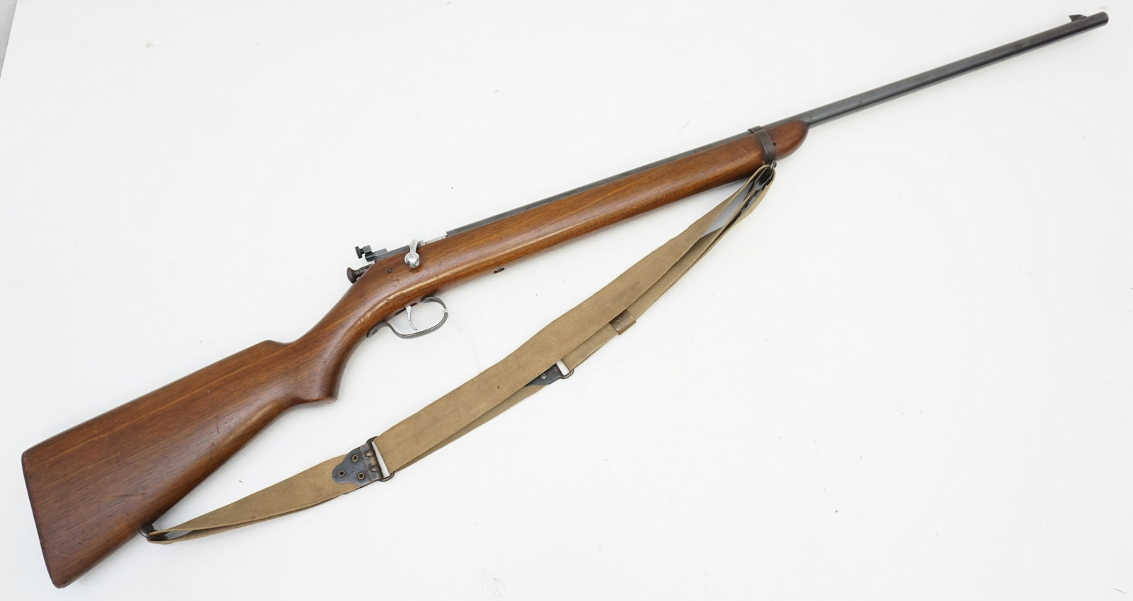 WINCHESTER 60A TARGET RIFLE 22 CALIBER: Winchester Model 60A Target Rifle. 22 Caliber Long Rifle, 27" barrel, no S/N. This rifle was introduced in 1932 and ended with the war in 1939. Blued finish, smooth pistol-gripped walnut stock. The Mo
