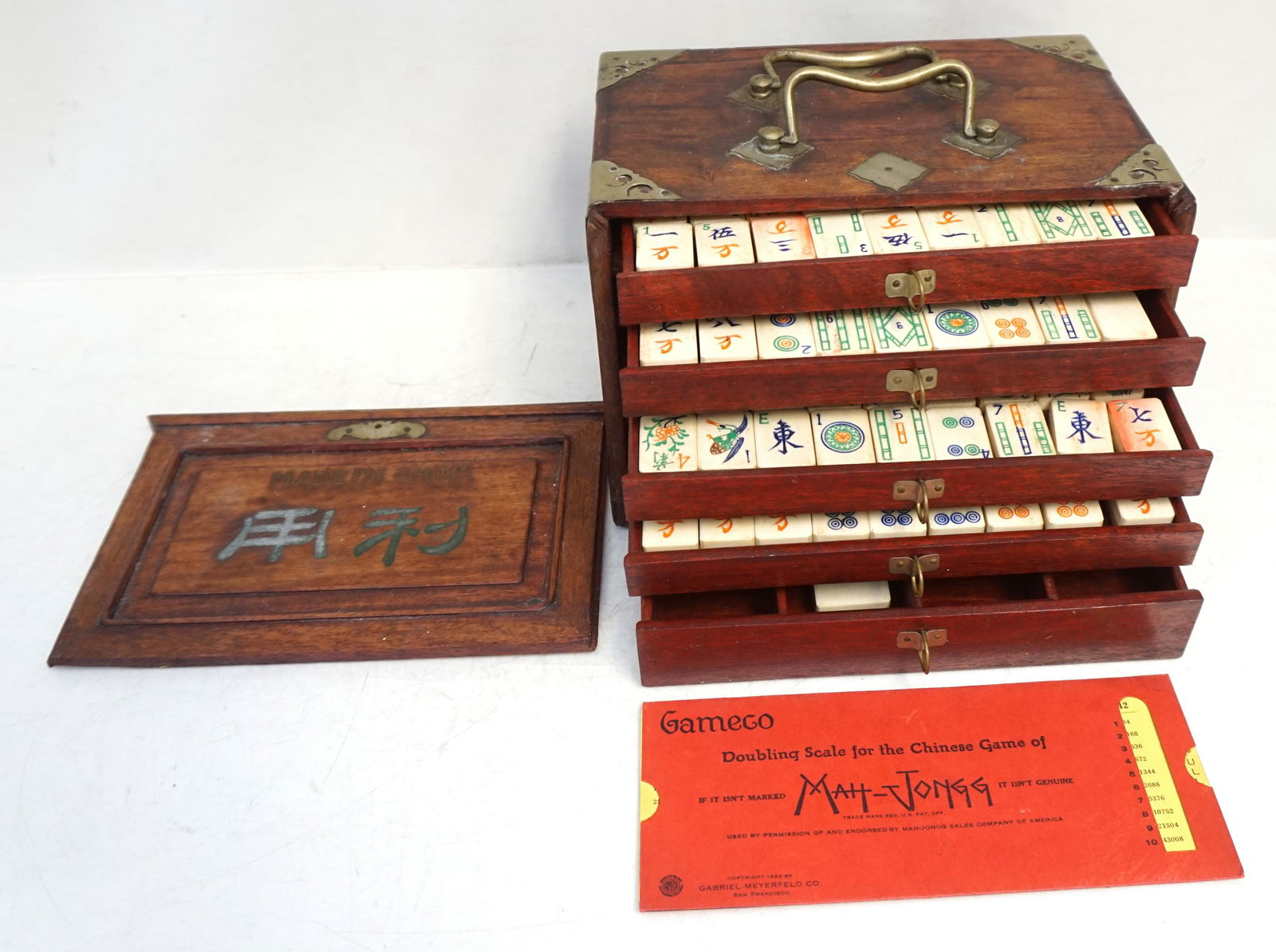 VINTAGE MAHJONG SET IN ORIGINAL WOOD BOX: Antique Bone and Bamboo Mahjong Set in the original Wood Box. Made by Gabriel-Meyerfeld Co. in San Francisco. copyright 1923.. 153 pieces, complete with dice, counting sticks etc. A great set for the