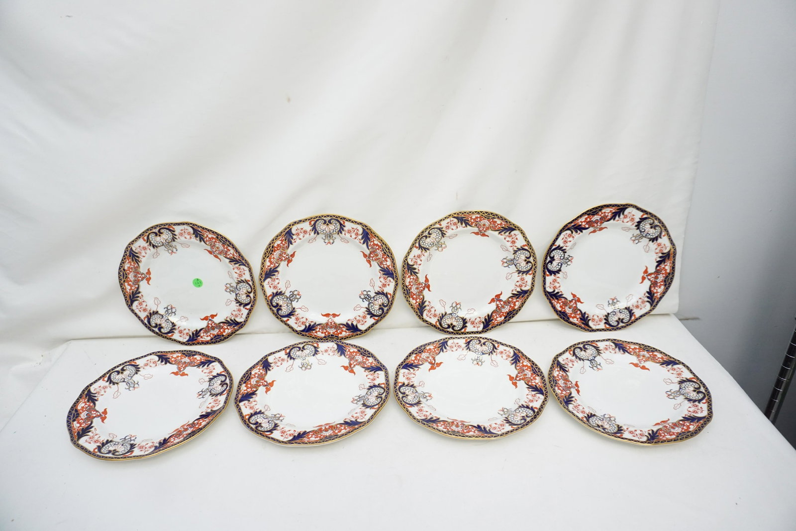 8 ANTIQUE ROYAL CROWN DERBY IMARI PLATES: Eight (8) Royal Crown Derby Dinner Plates in the early Imari Pattern #3615. The backs with mark used from 1891 to 1921 by the Osmaston Road factory and a embossed derby mark. Each 10 1/4", good condit