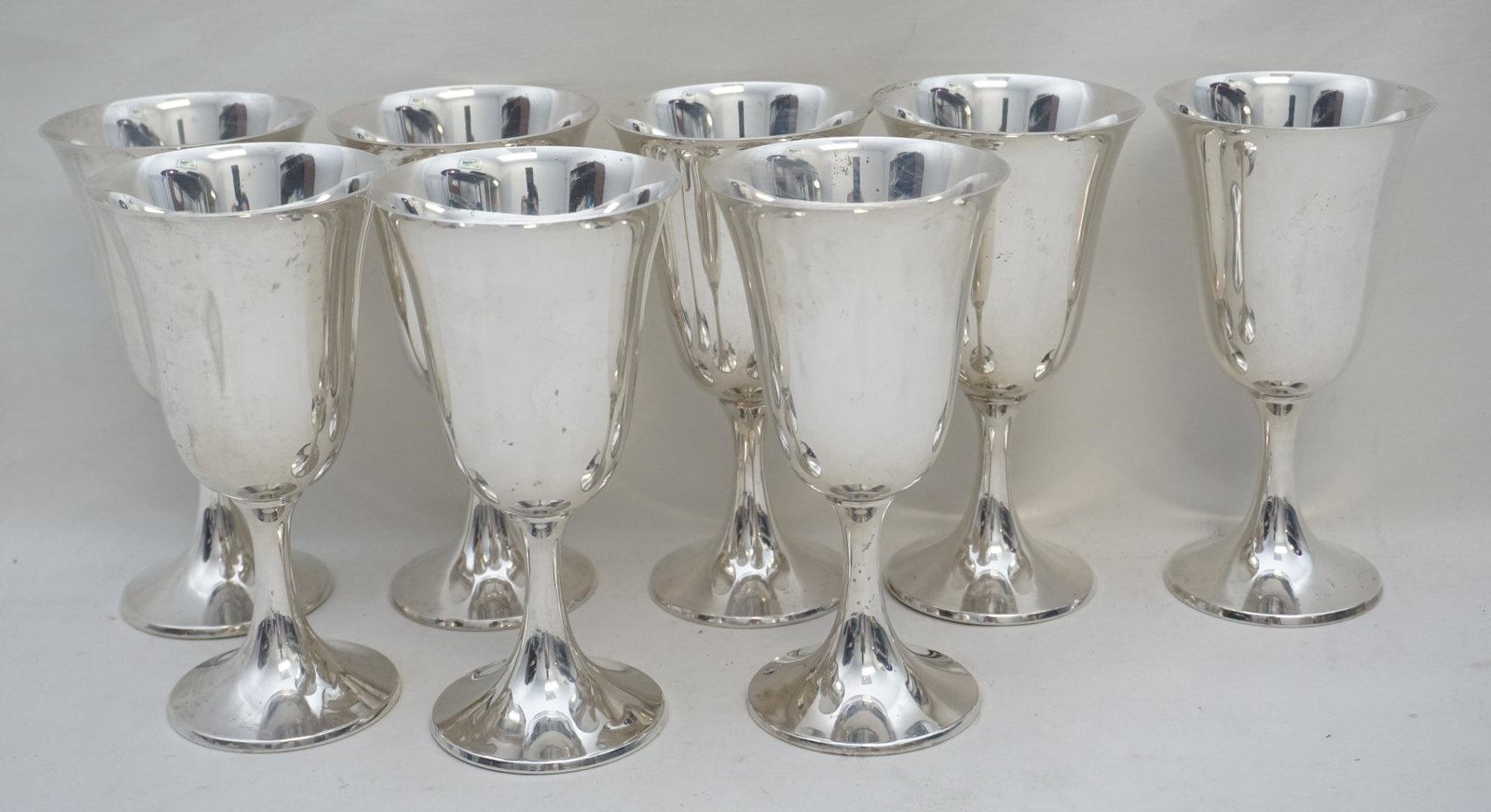 8 STERLING SILVER REYNERS WINE GOBLETS: 8 Vintage Sterling Silver Reyner's Wine Goblets. No monograms.Each stamped Reyner's Sterling. Each 6 1/2". Approximate weight on all 1250 grams. PROVENANCE: Edwin Moore Brogdon, PhD, collection. Dr. B