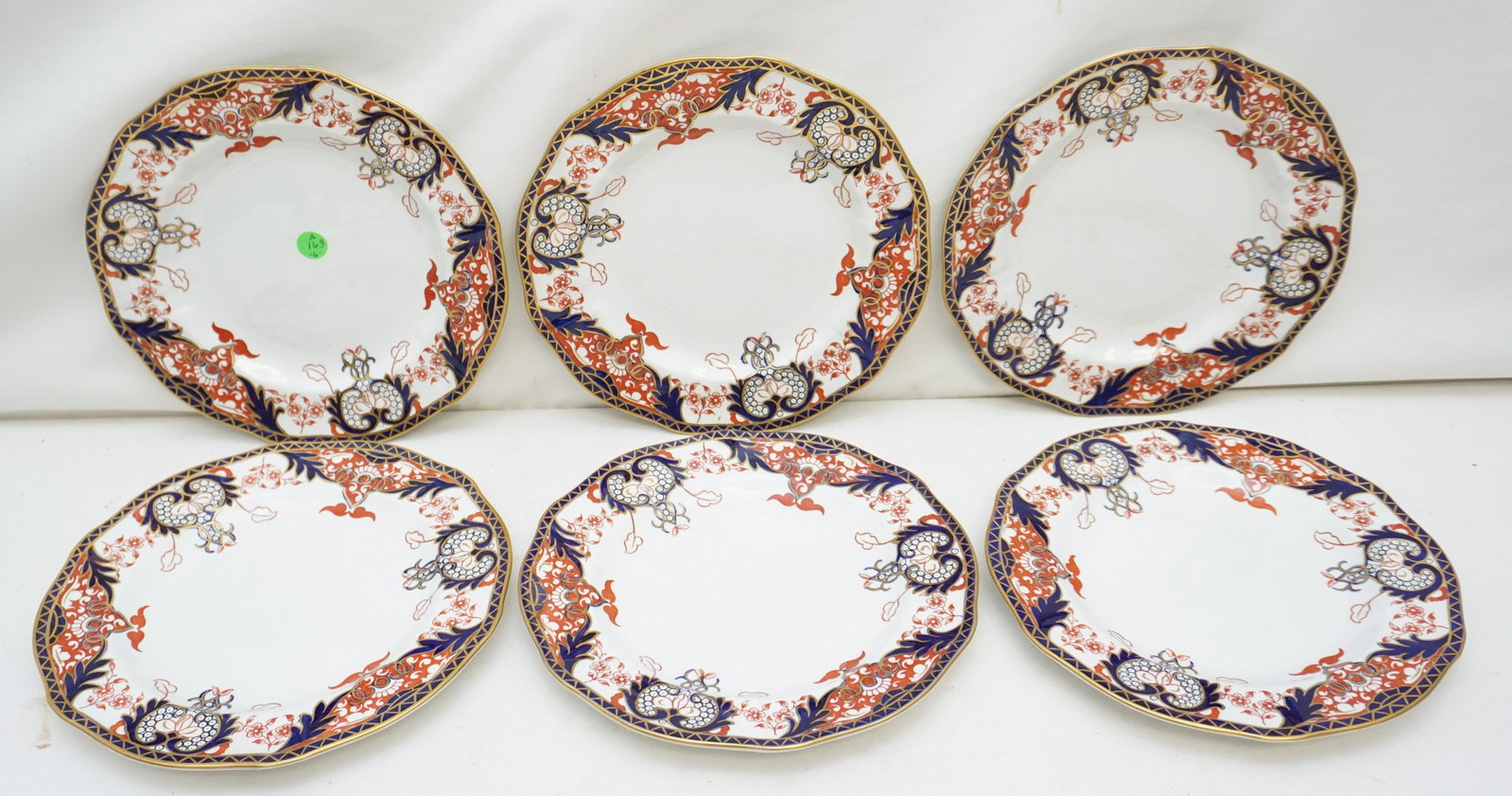 6 ANTIQUE ROYAL CROWN DERBY IMARI PLATES: Six (6) Royal Crown Derby Dinner Plates in the early Imari Pattern #3615. The backs with mark used from 1891 to 1921 by the Osmaston Road factory and a embossed derby mark. Each 10 1/4", good conditio