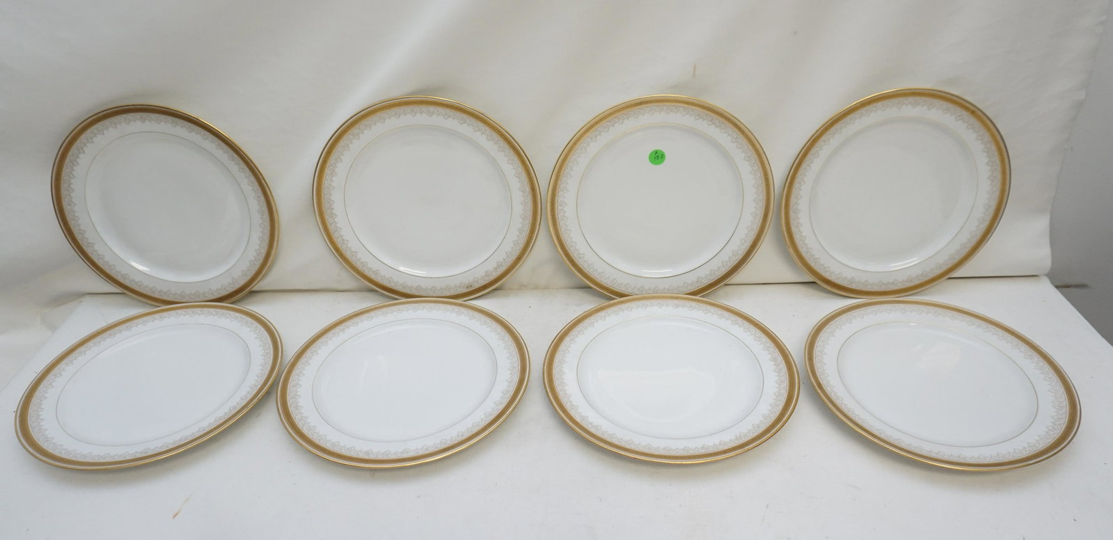 SET OF 8 MARTIAL REDON LIMOGES PLATES: Set of 8 Limoges France Martial Redon Gilt Decorated Dinner Plates. Each 10 1/4". Weight on all 10 pds 6 oz. PROVENANCE: Edwin Moore Brogdon, PhD, collection. Dr. Brogdon was the owner of Brogdon Mano