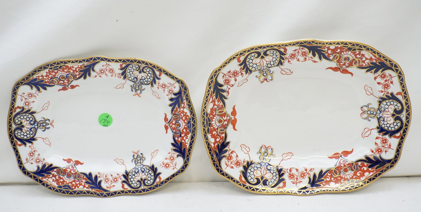 2 PC ANTIQUE ROYAL CROWN DERBY IMARI: Pair of Royal Crown Derby Platters in the early Imari Pattern #3615. The base with mark used from 1891 to 1921 by the Osmaston Road factory and a embossed derby mark. Larger 11", good condition. Small