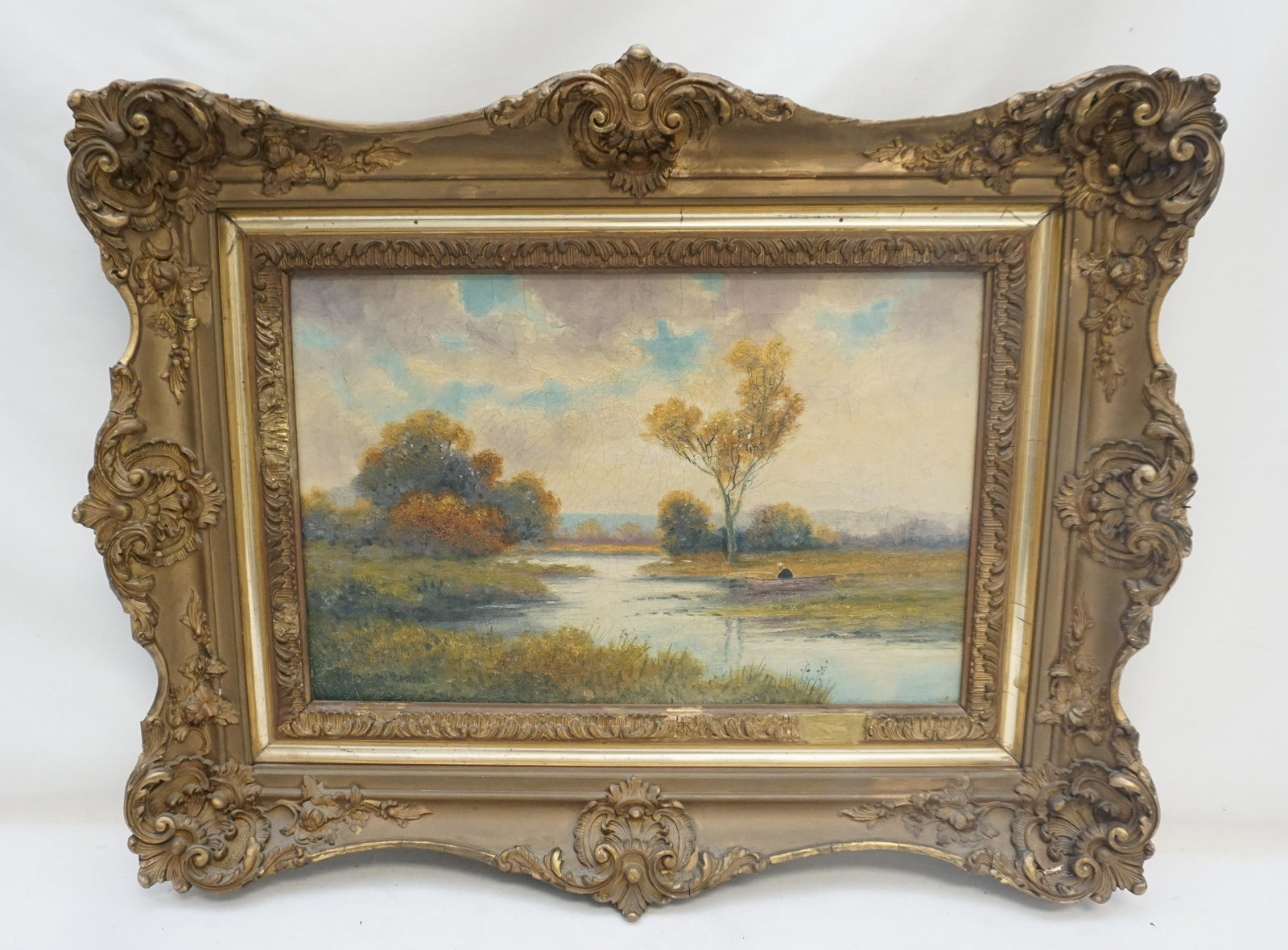 19th c O/C LANDSCAPE HODSON SMITH: Antique 19th c. Oil on Canvas Landscape with waterway and man in wooden boat. Impressionist, signed lower left T. or J. Hodson Smith. In period gilt and gesso frame. Small tear to sky, craquelure. Som