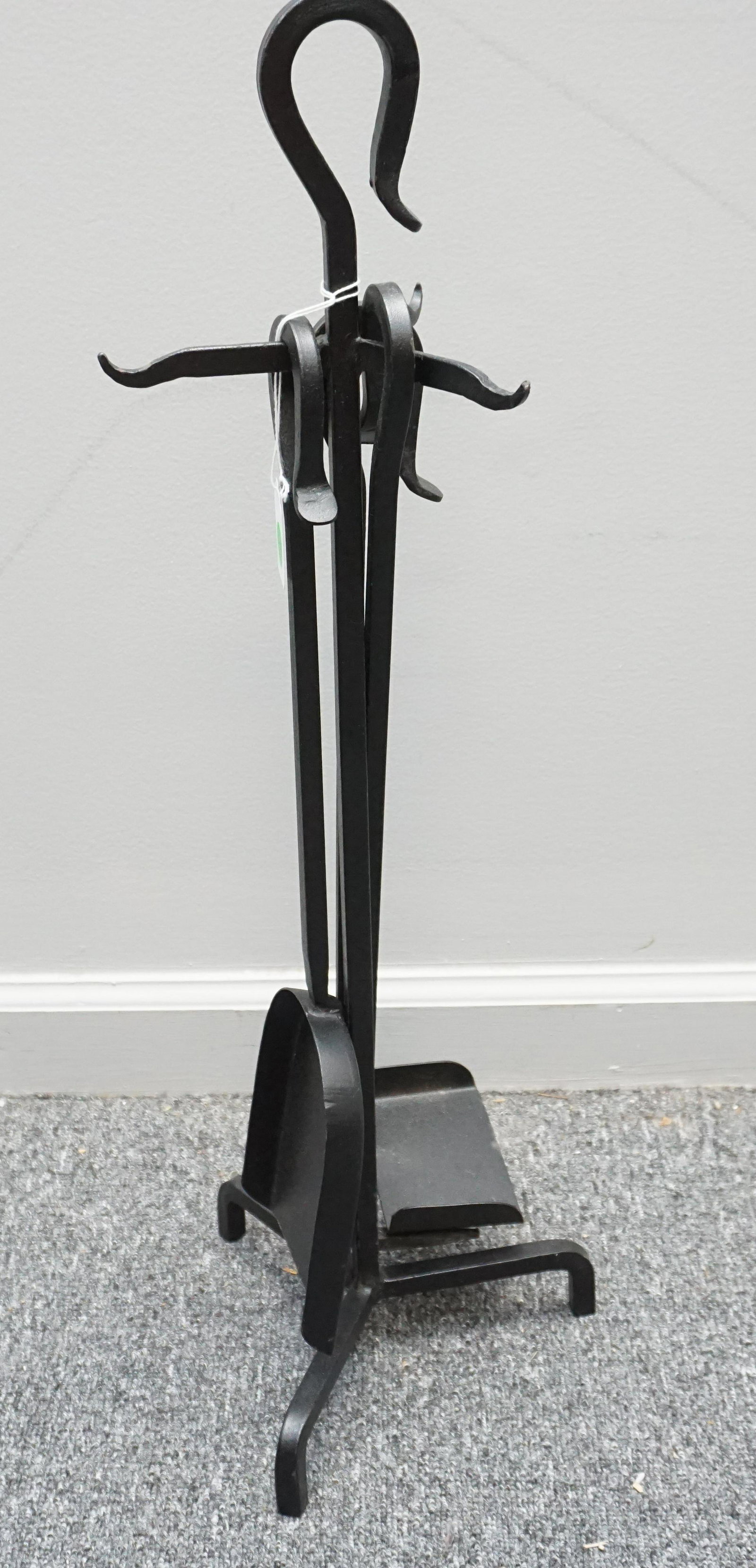 BLACK WROUGHT IRON FIREPLACE SET: Black Wrought Iron Fireplace Set with 3 Tools and Stand. Stand measures 8 1/2"x8 1/2"x26". Weight 8 pds. PROVENANCE: A Private Charleston SC Estate. ***Pickup only or Shipping on this item offered thr