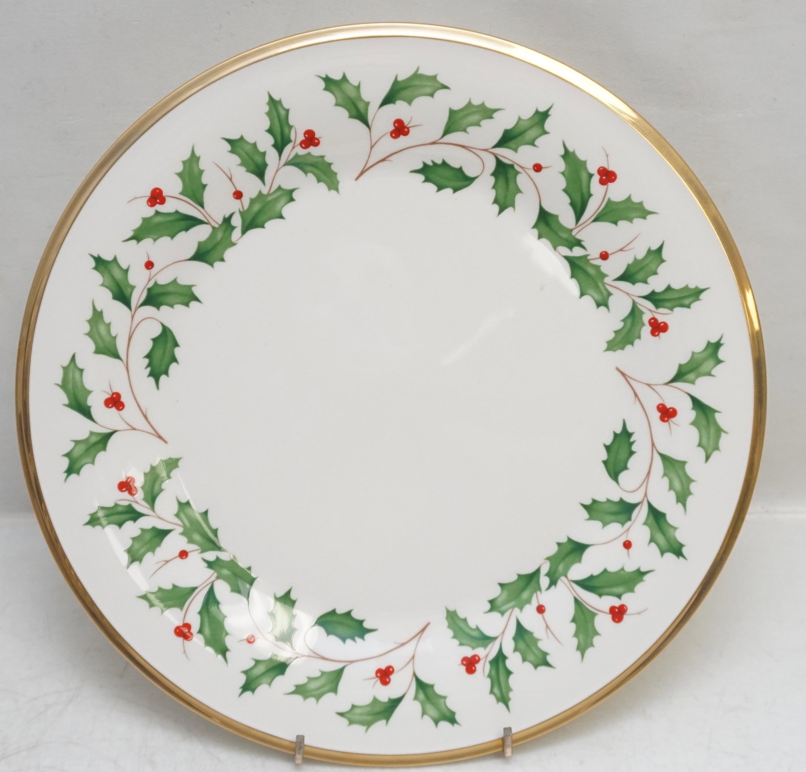 12 LENOX HOLIDAY DINNER PLATES: Twelve (12) Holiday (Dimension) Fine Bone China Dinner Plates from Lenox. Like new, unused, many with the price tags still on. Dimension Shape, Holly, Berries, Gold Trim. Each 10 3/4". Weight on all 1