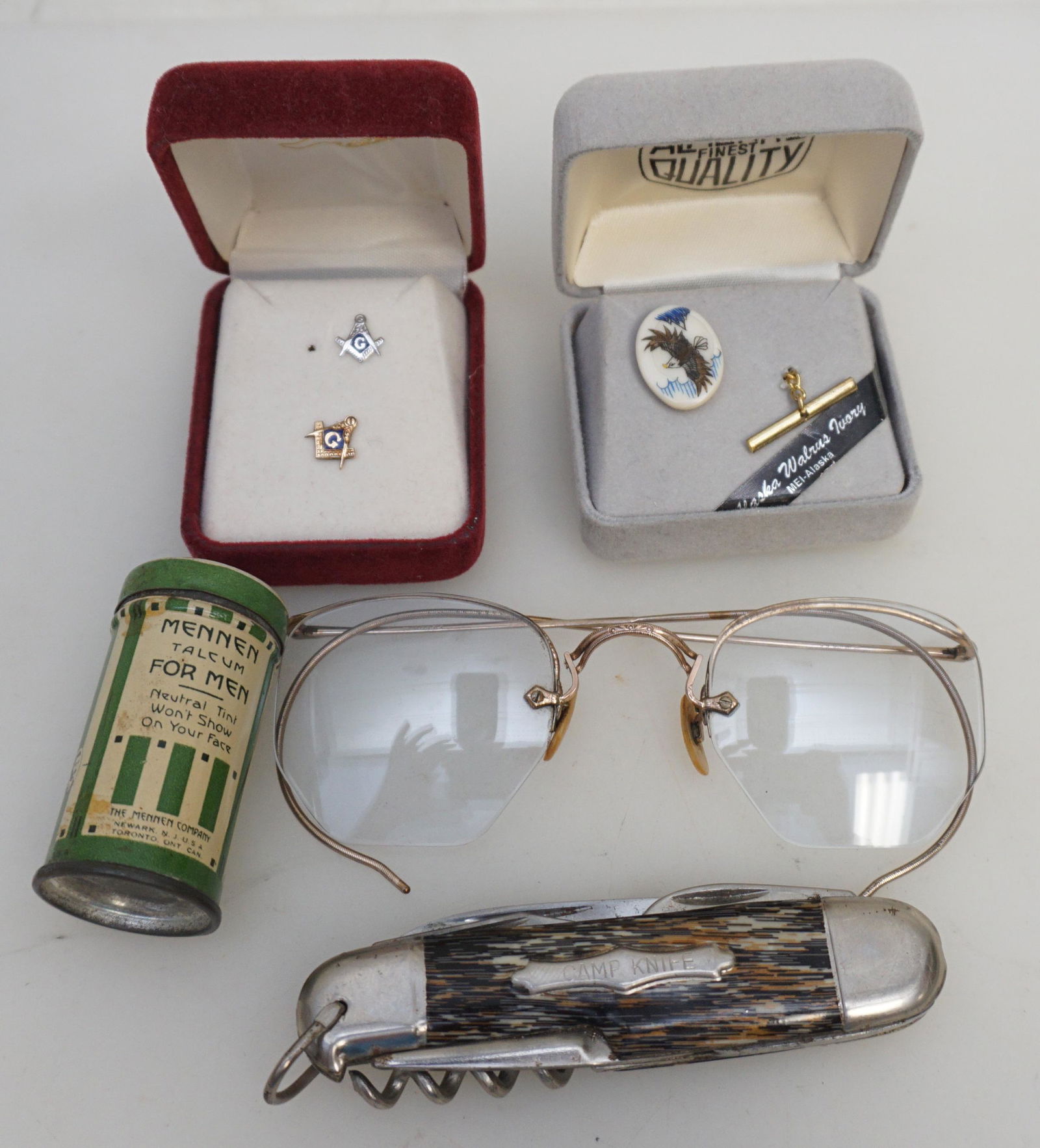 6 PC GENTLEMANS LOT ANTIQUE / VINTAGE: All are Antique / Vintage. 1- American Optical 12k Gold Filled Spectacles. 2- Small 14k Masonic Tie-Tack Pin. 3- Small Silver Masonic Tie-Tac Pin. 4- Alaska Scrimshaw Eagle Tie Tac. 5- Camp Knife Pock