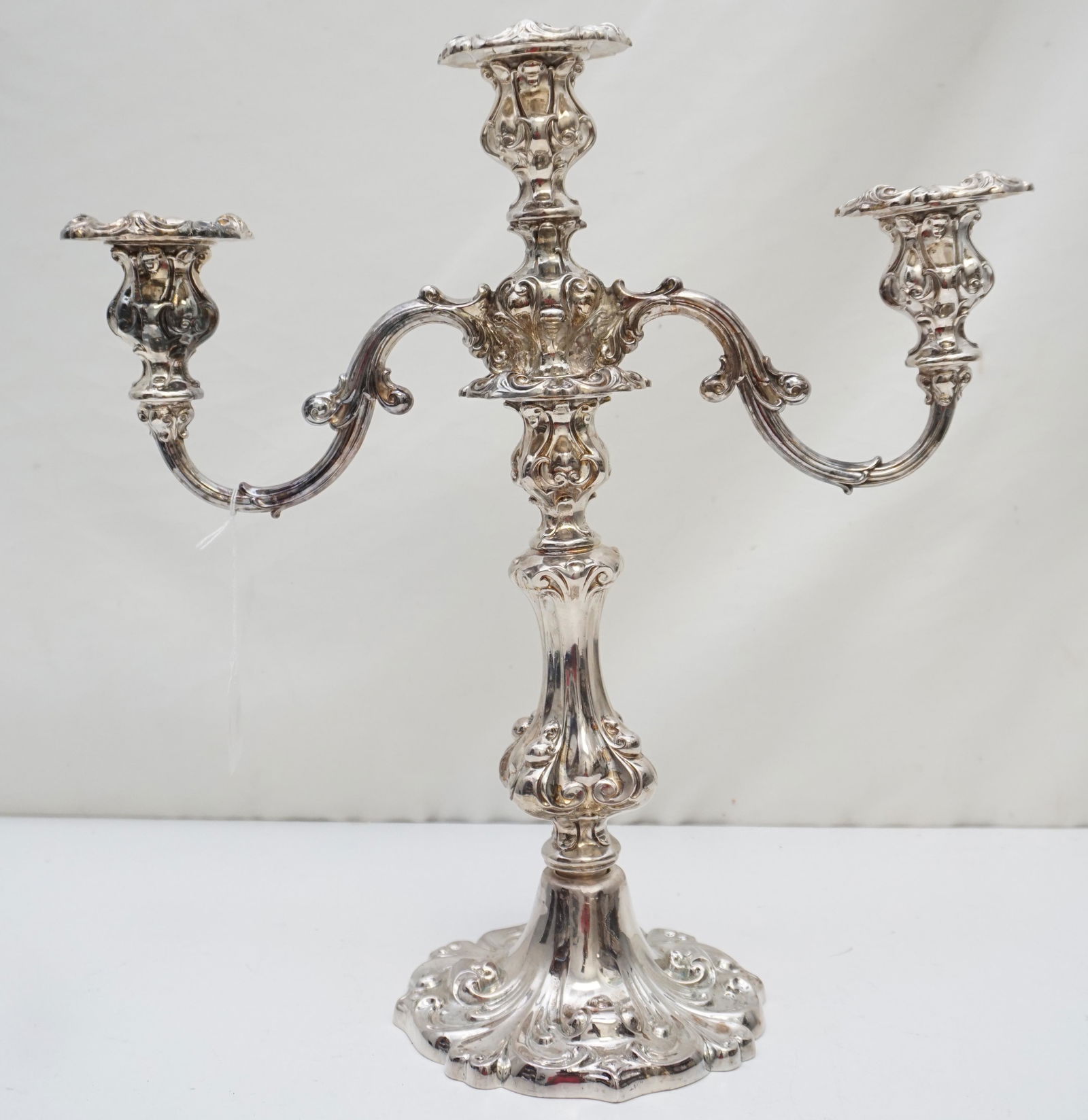 LARGE WALLACE S/P CANDELABRA: Large Ornate Silver Plated Weighted Candelabra by Wallace. Measures 15 1/2"x16 1/2". Weight 9 pds 10 oz. PROVENANCE: Edwin Moore Brogdon, PhD, collection. Dr. Brogdon was the owner of Brogdon Manor, a