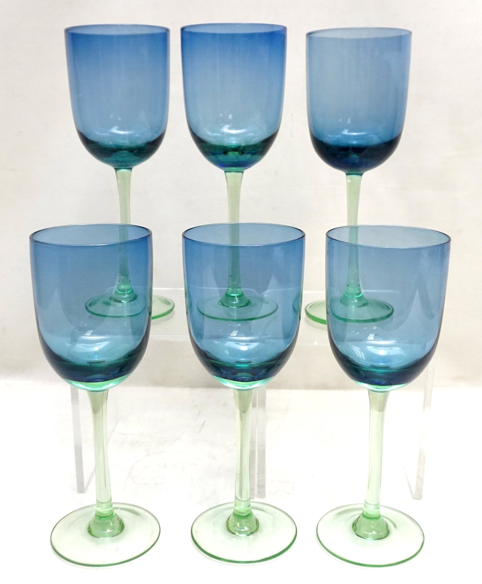 6 BLOCK CRYSTAL FESTIVAL WINE GLASSES: 6 Block Crystal Festival Wine Glasses, Blue with Green Stems. Each 8 1/4". Weight on all 2pds 12 oz. . PROVENANCE: Edwin Moore Brogdon, PhD, collection. Dr. Brogdon was the owner of Brogdon Manor, a s